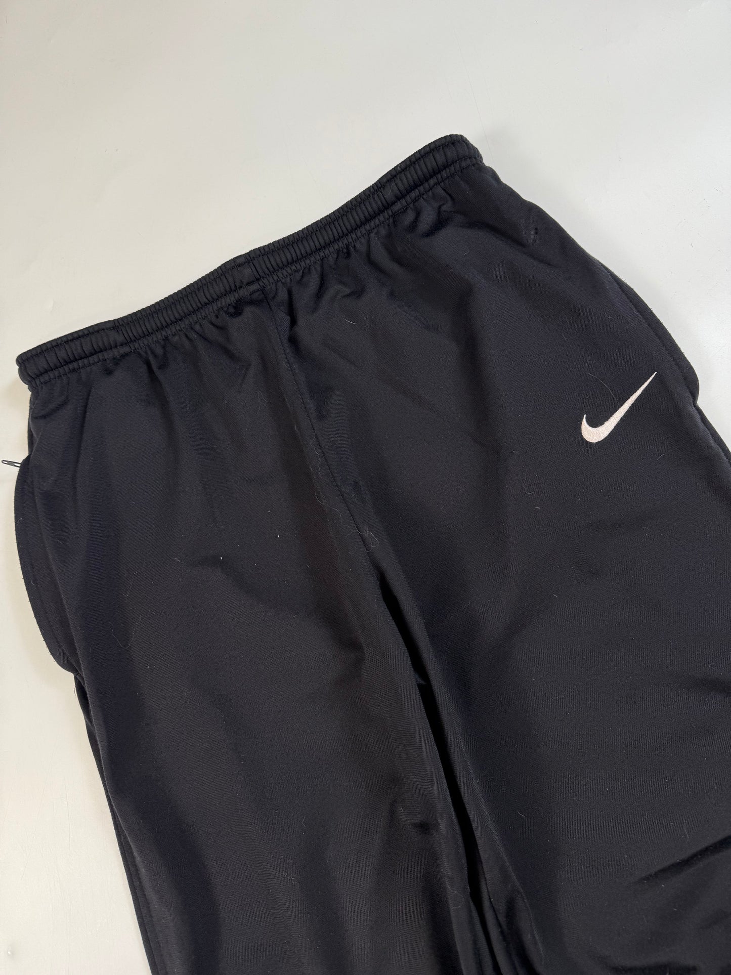 Vintage 90s Nike mini swoosh track pants (L)