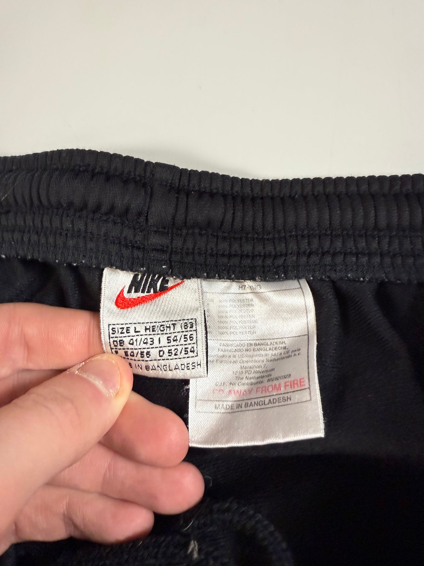 Vintage 90s Nike mini swoosh track pants (L)
