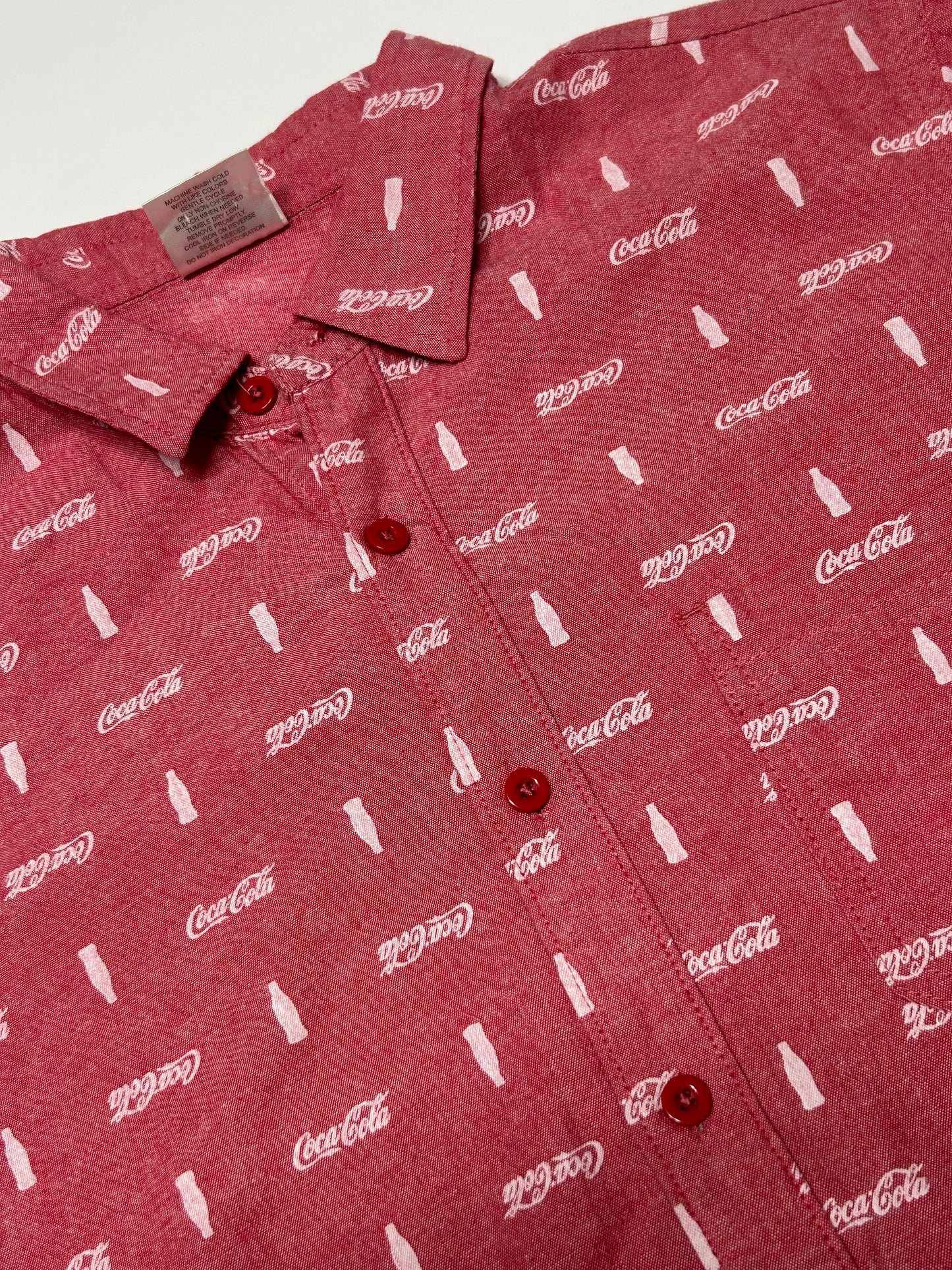 Coca cola all over print shirt (M)