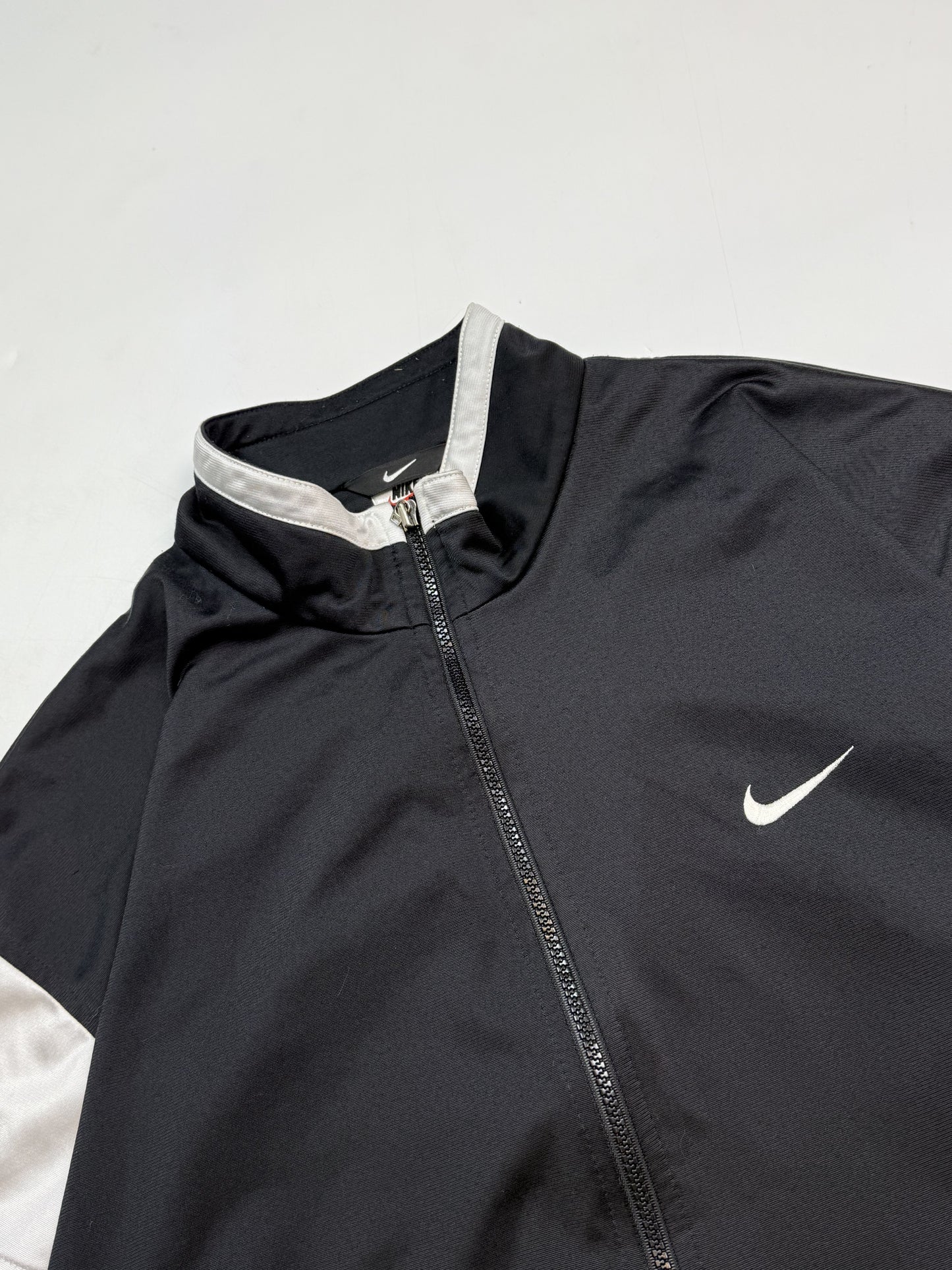 Vintage 90s Nike mini swoosh track jacket (L)