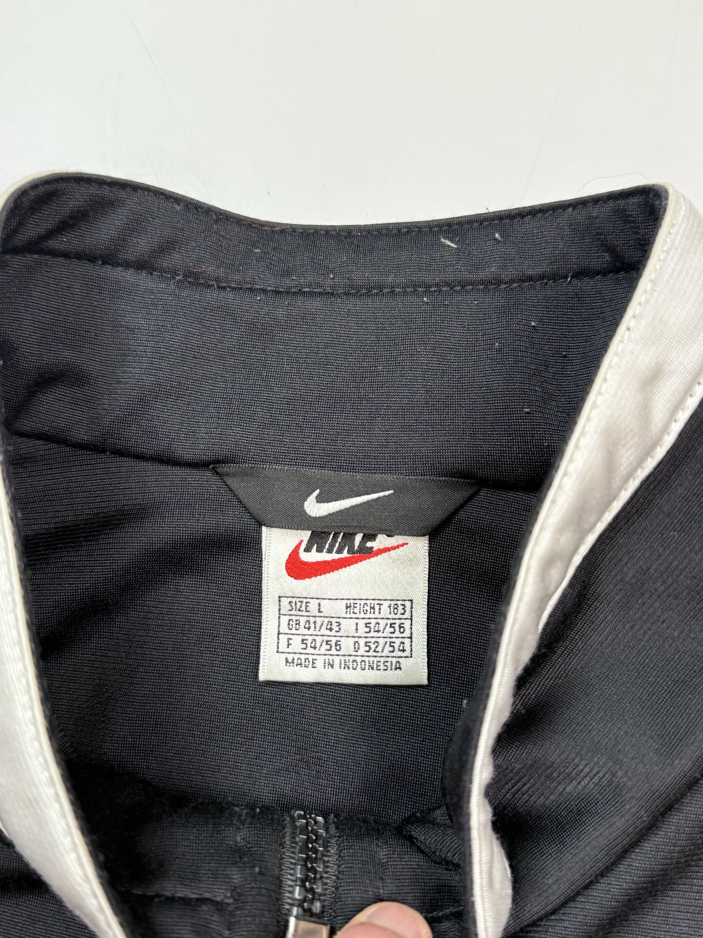 Vintage 90s Nike mini swoosh track jacket (L)