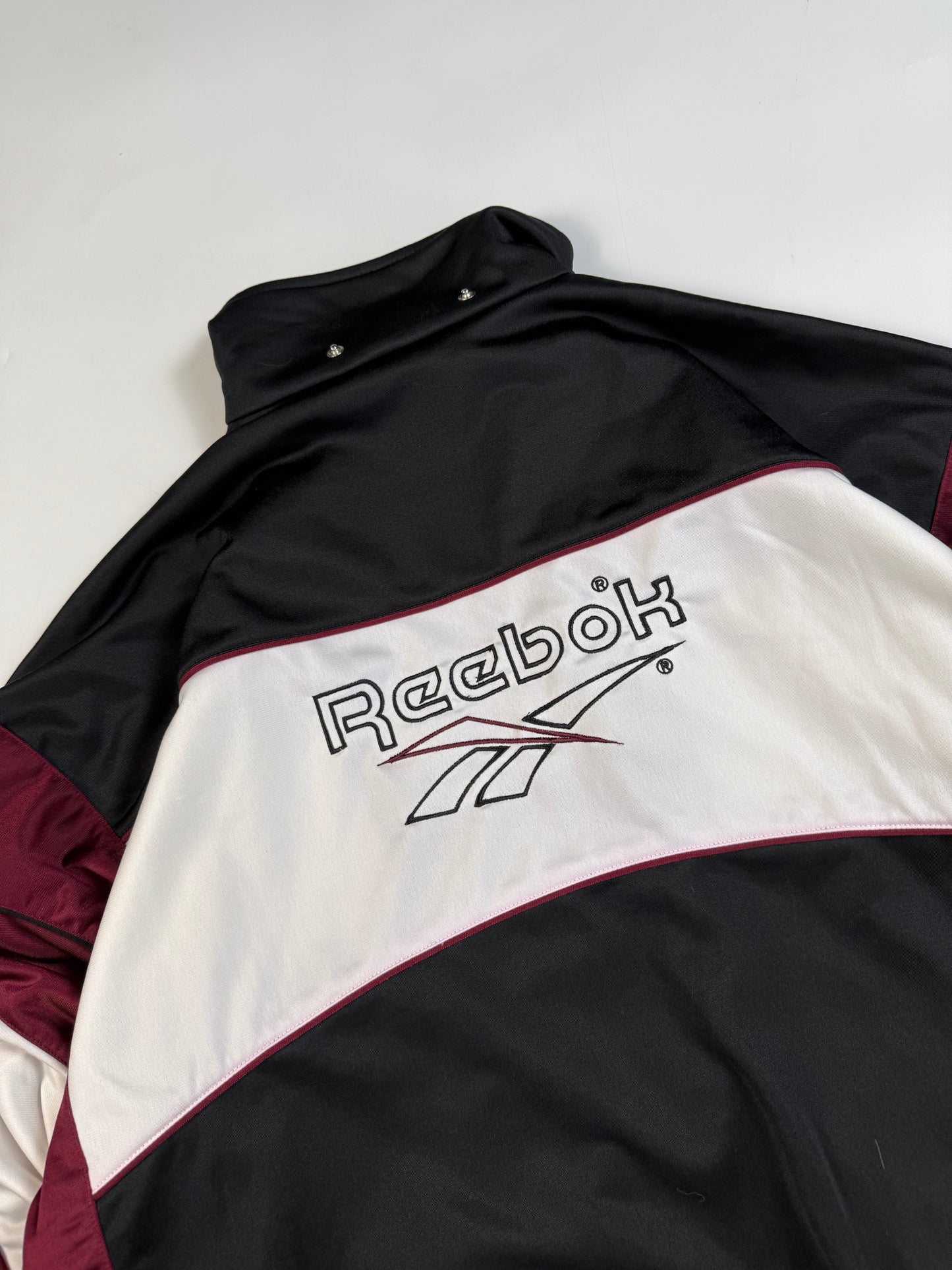 Vintage 90s Reebok spell out track jacket (L)