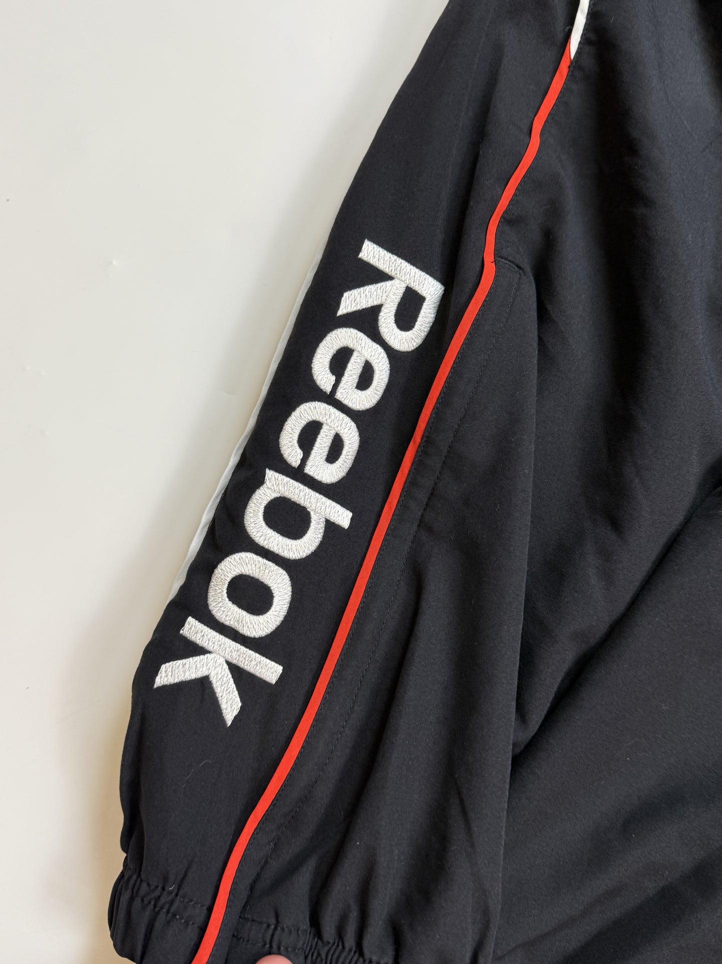 Vintage Reebok spell out track pants (M)