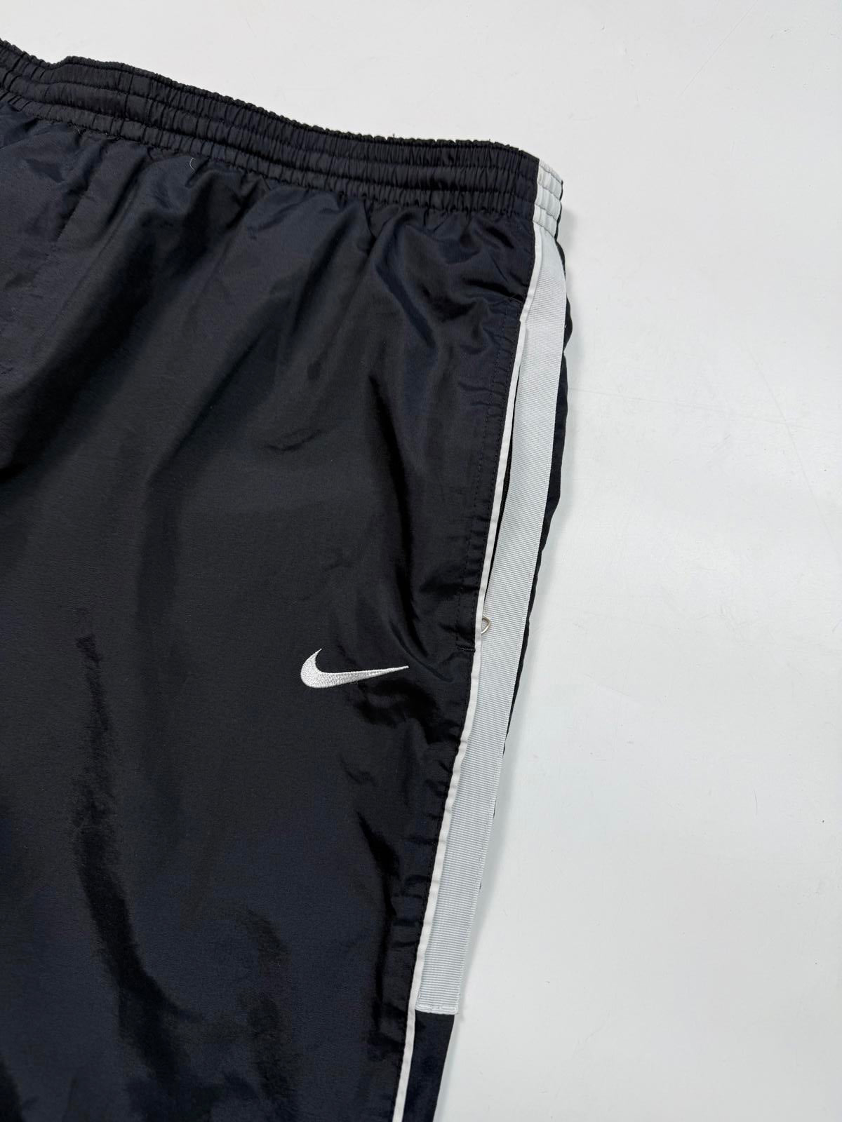 Vintage Nike side stripe baggy track pants (L)