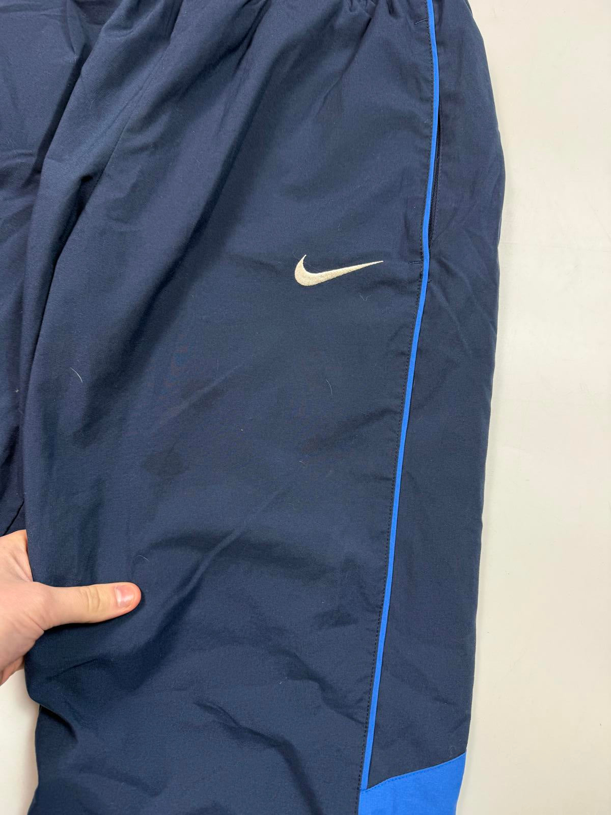 Vintage Nike side stripe baggy track pants (M)