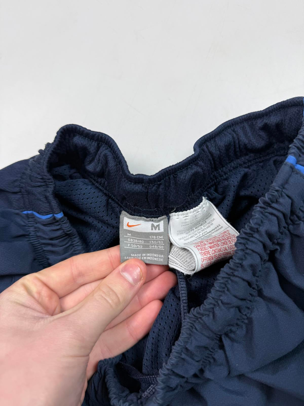 Vintage Nike side stripe baggy track pants (M)