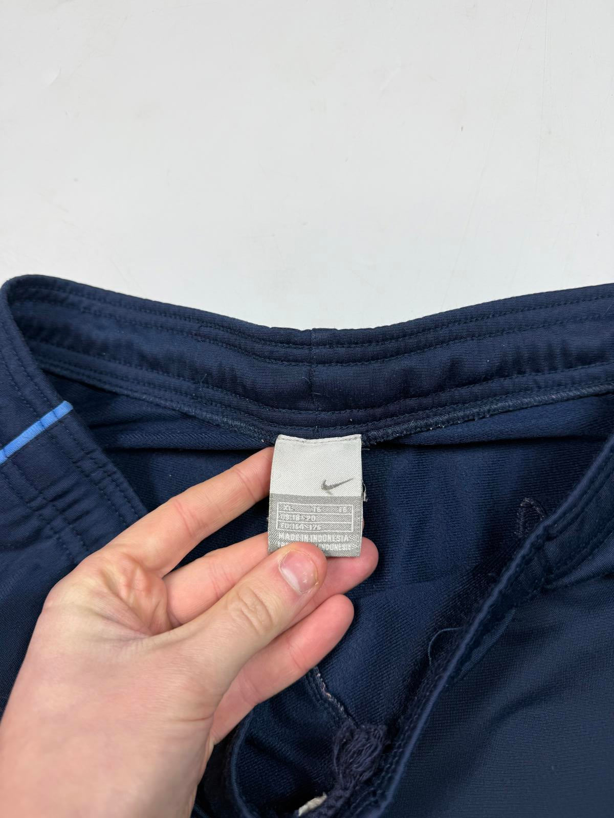 Vintage Nike baggy track pants (S)