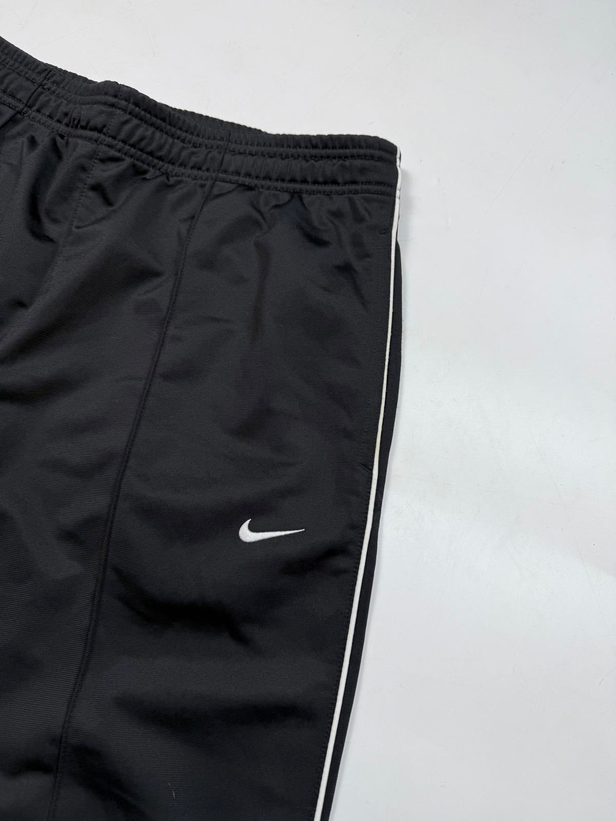 Vintage Nike mini swoosh baggy track pants (M)