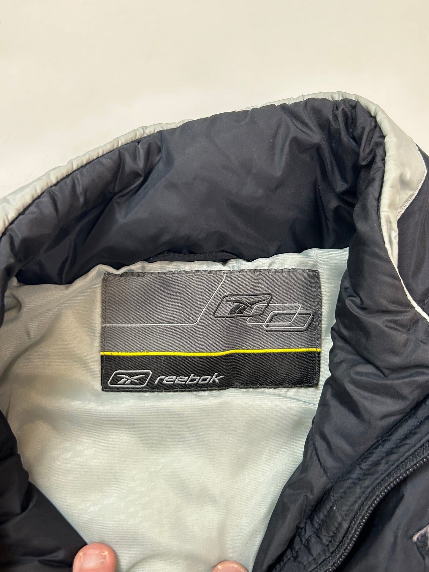 Vintage Reebok spell out puffer jacket (L)