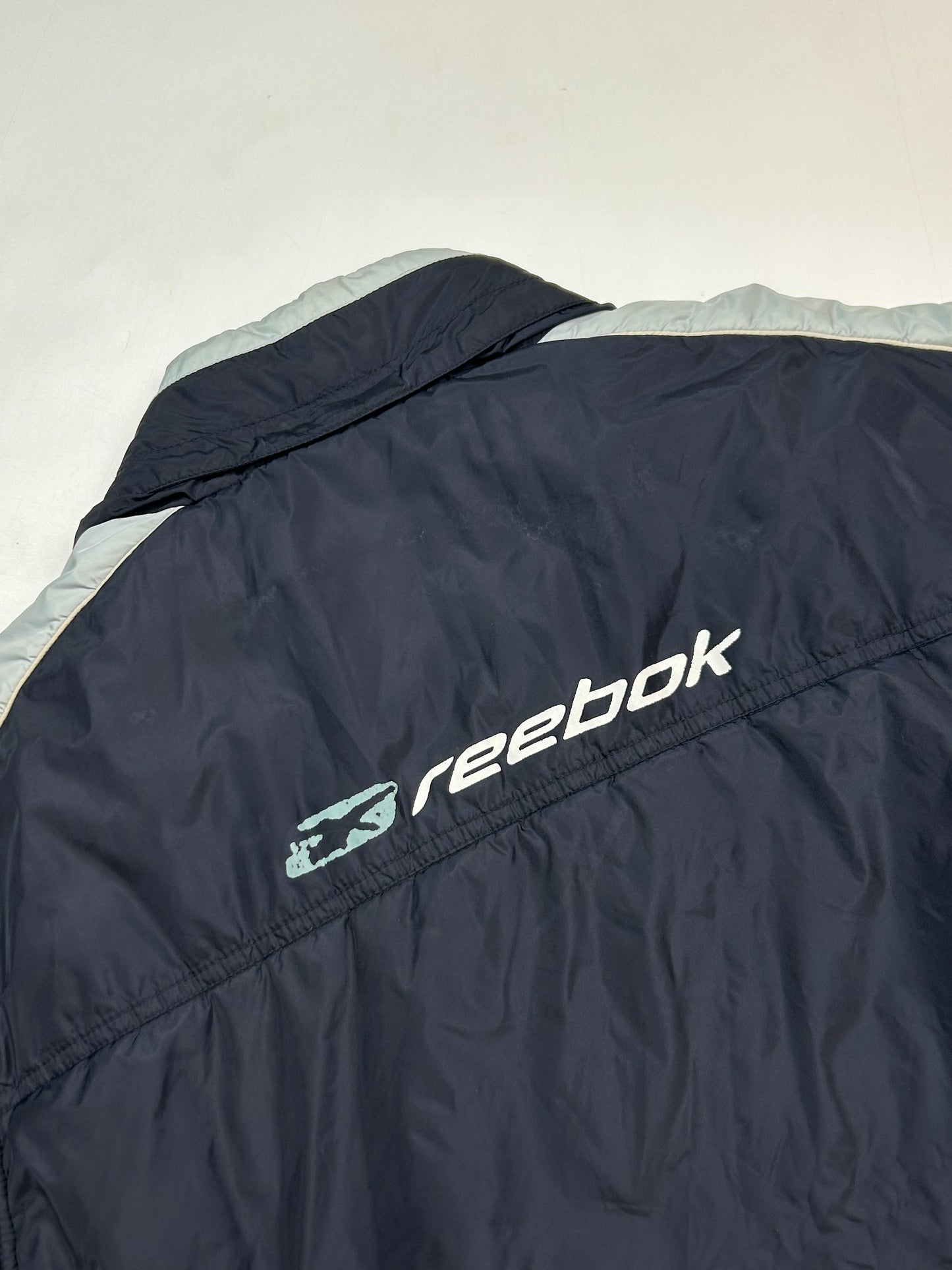 Vintage Reebok spell out puffer jacket (L)