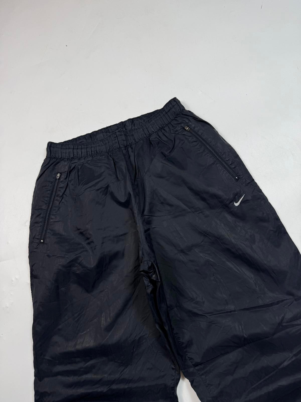 Vintage 90s Nike mini swoosh baggy track pants (M)