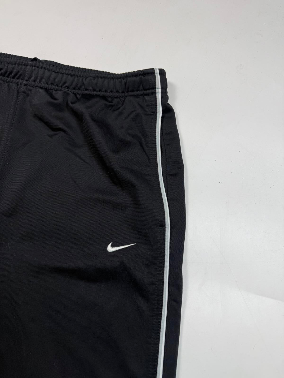 Vintage Nike mini swoosh baggy track pants (L)