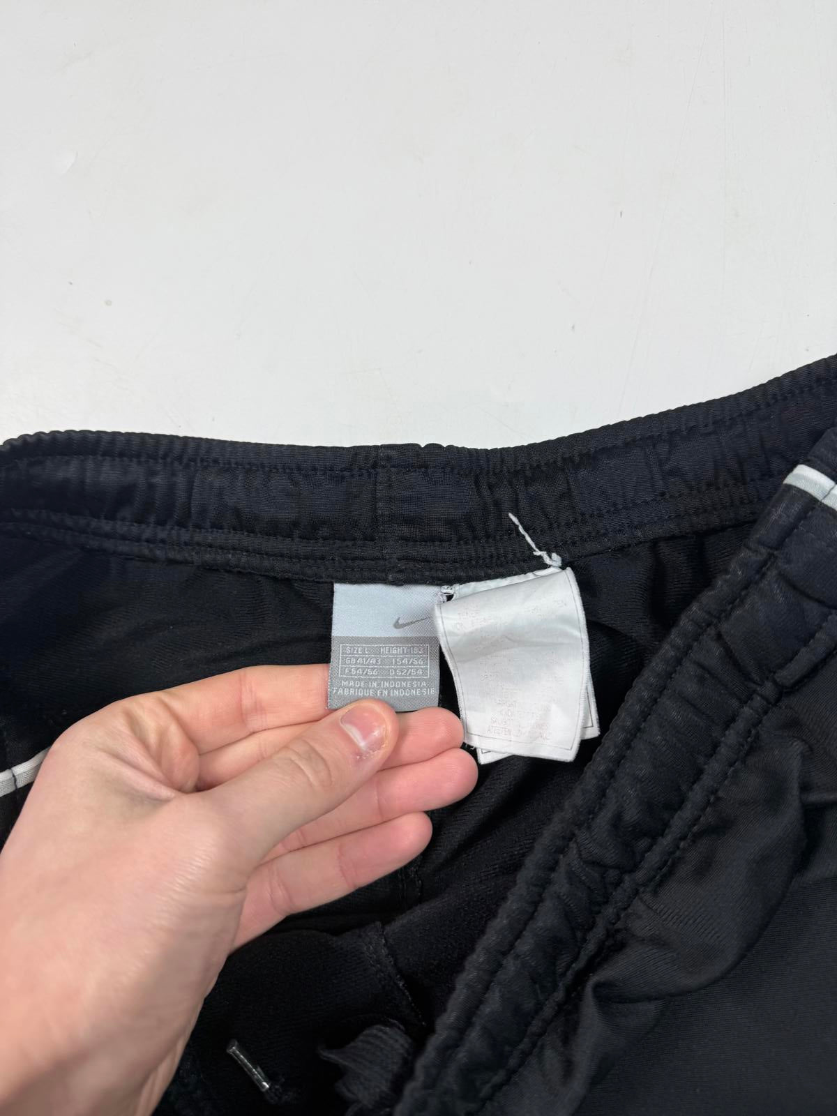 Vintage Nike mini swoosh baggy track pants (L)