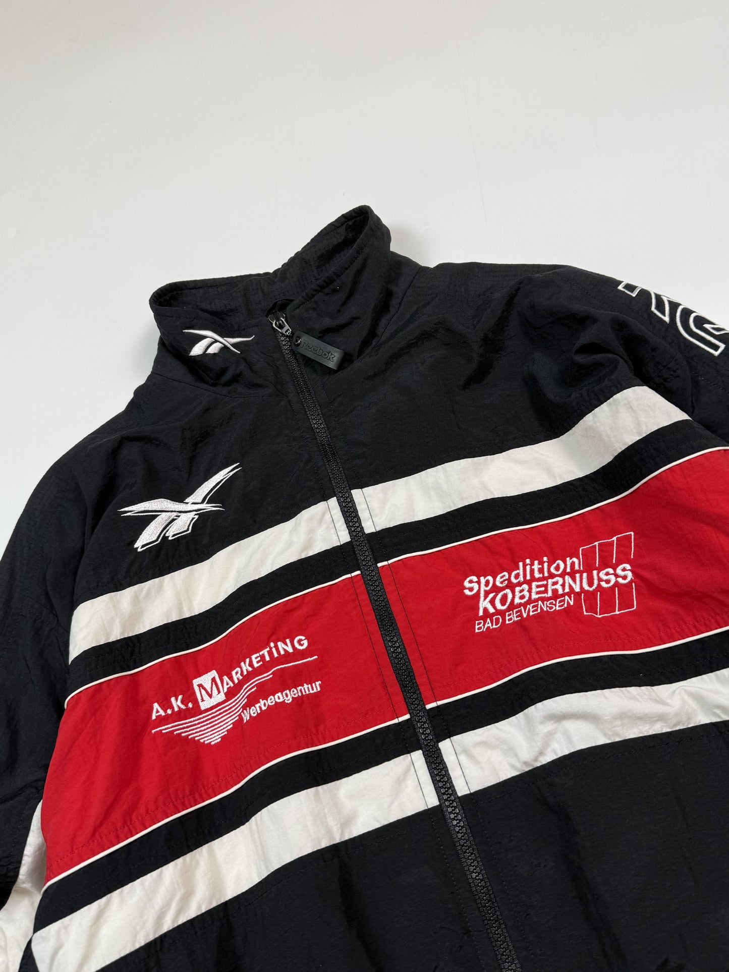 Vintage Reebok spell out track jacket (M)