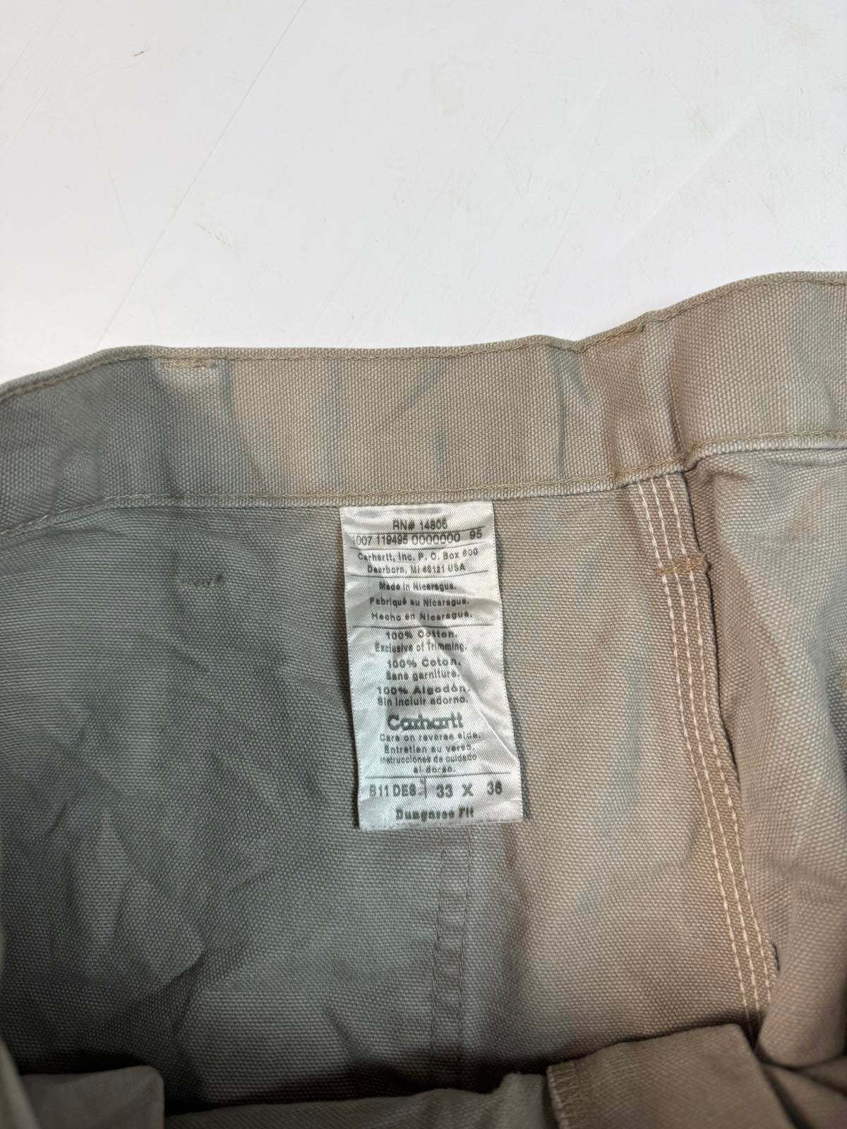 Vintage Carhartt baggy carpenter pants (W33)