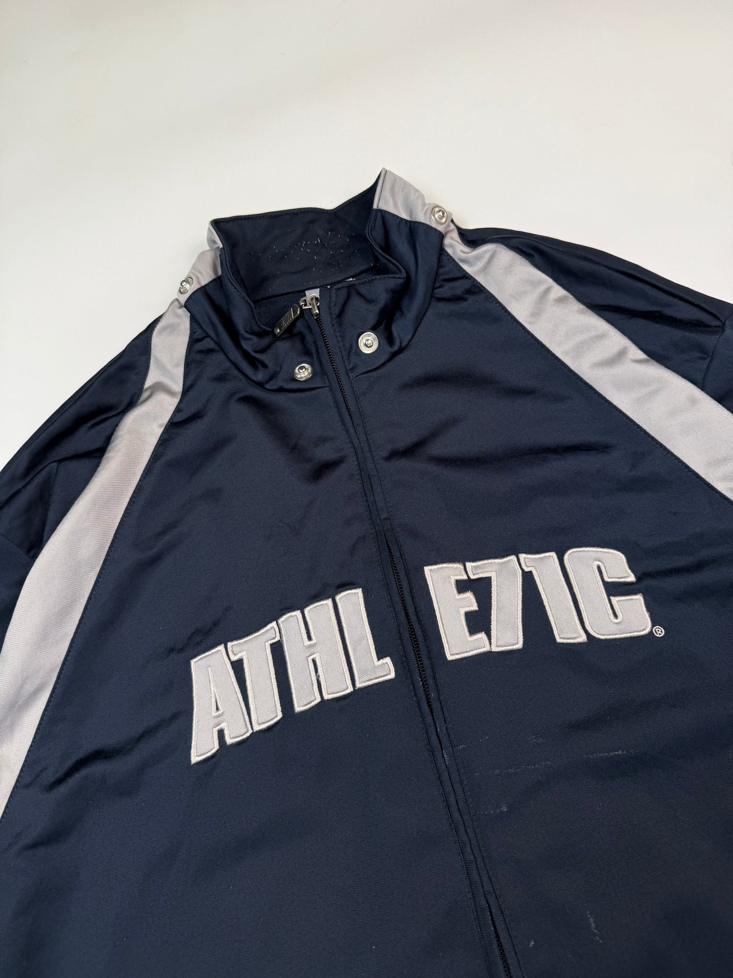 Vintage Nike athletic spell out track jacket (XL)