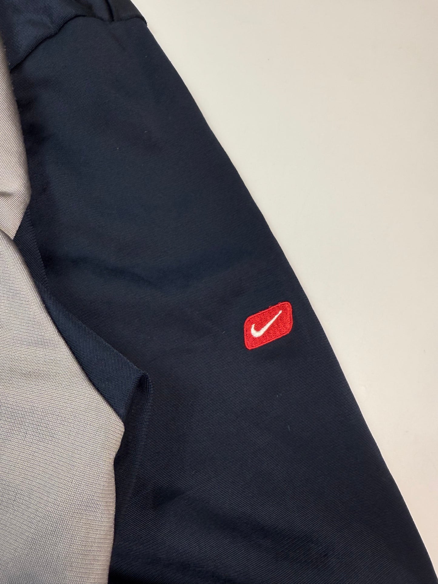 Vintage Nike athletic spell out track jacket (XL)