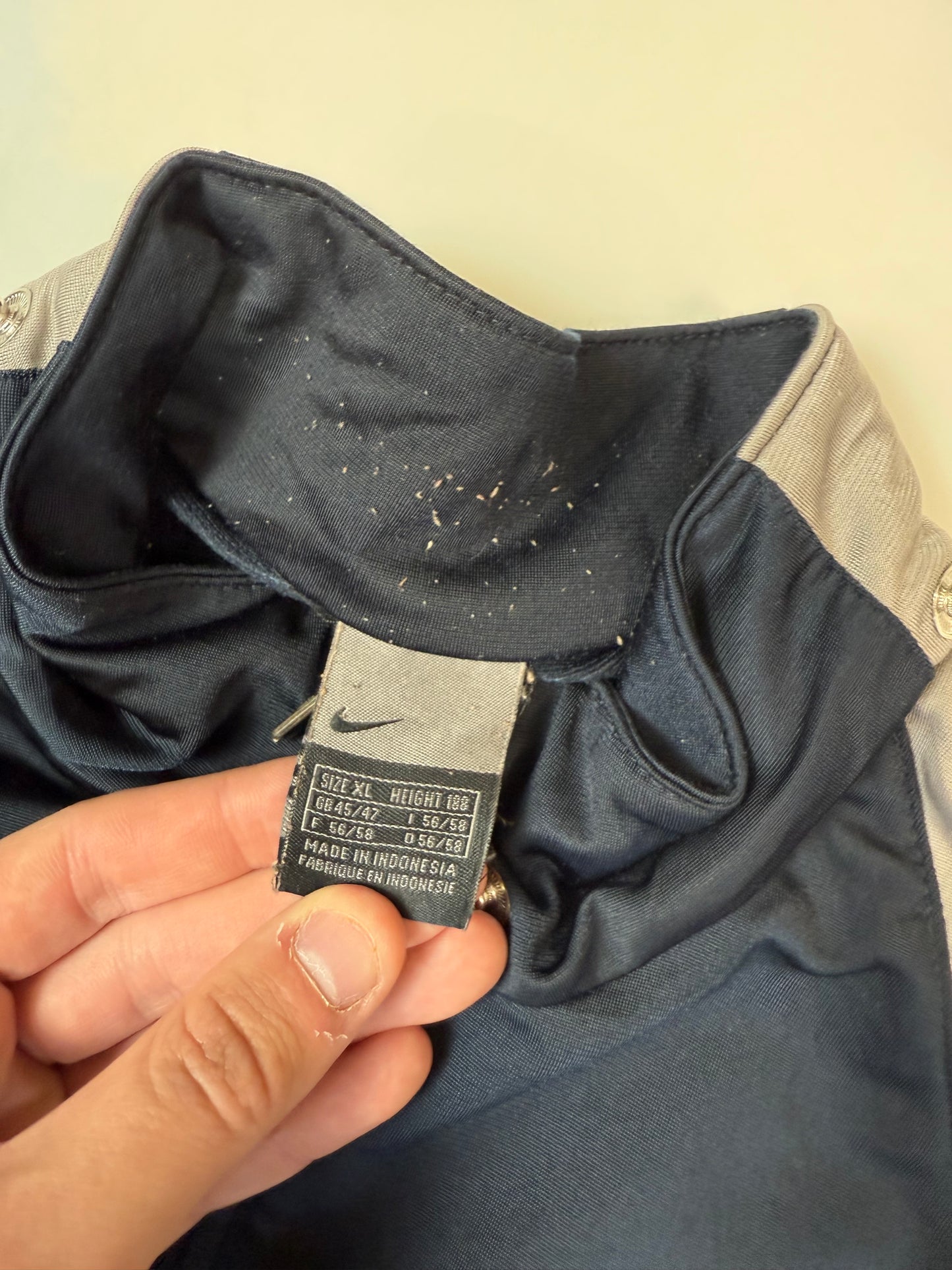 Vintage Nike athletic spell out track jacket (XL)