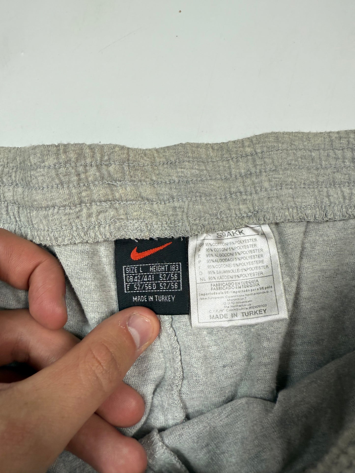 Vintage 90s Nike mini swoosh baggy sweat shorts (L)