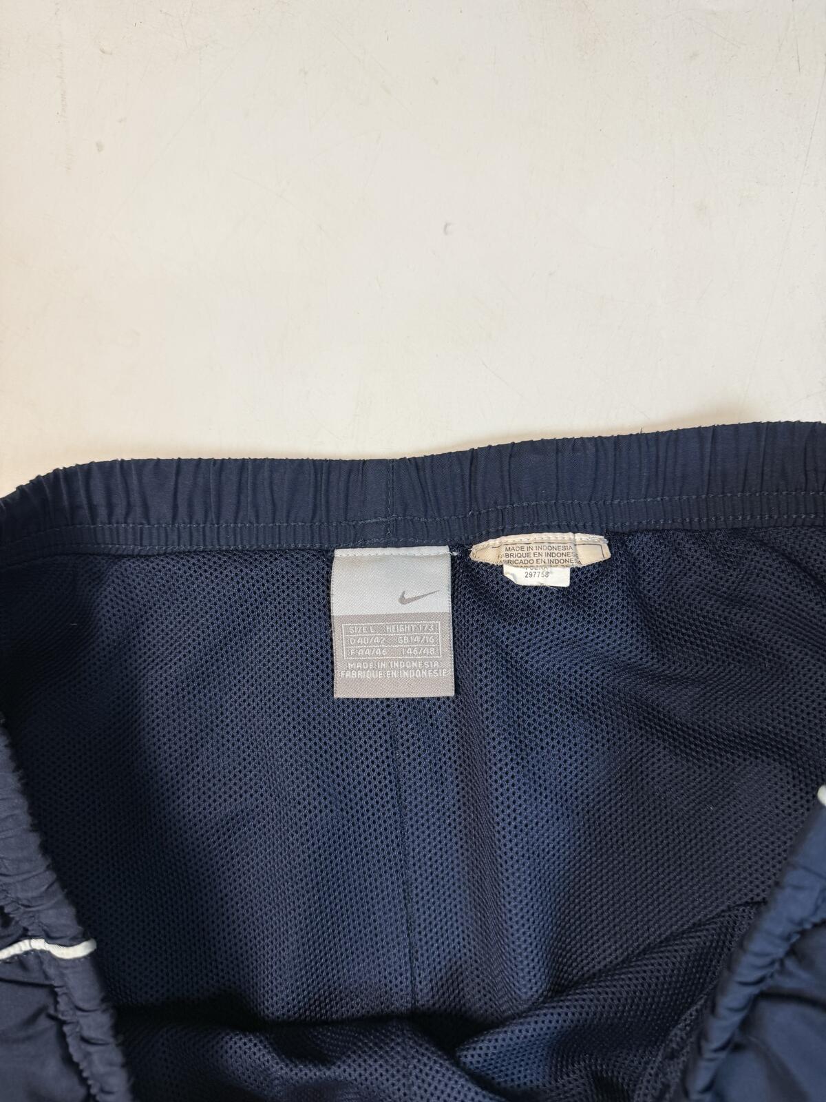 Vintage Y2K Nike baggy track pants (L)