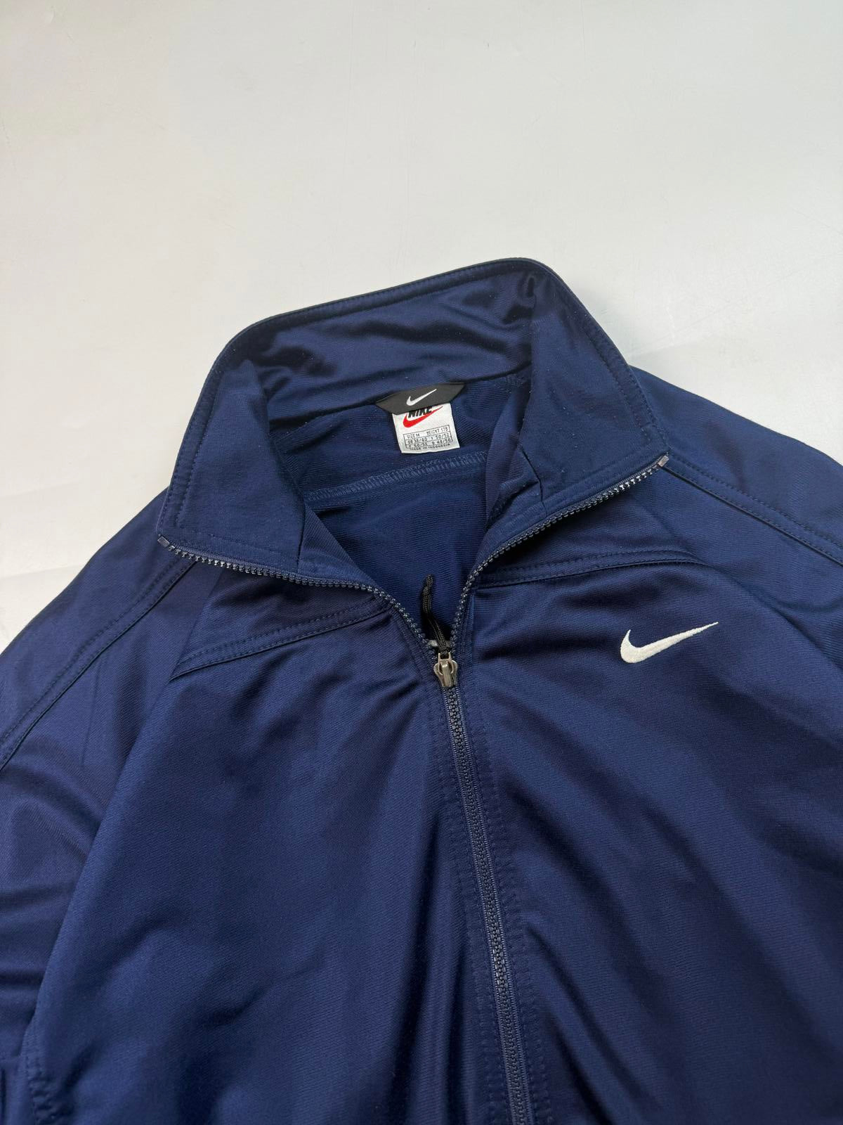 Vintage 90s Nike mini swoosh track top (M)