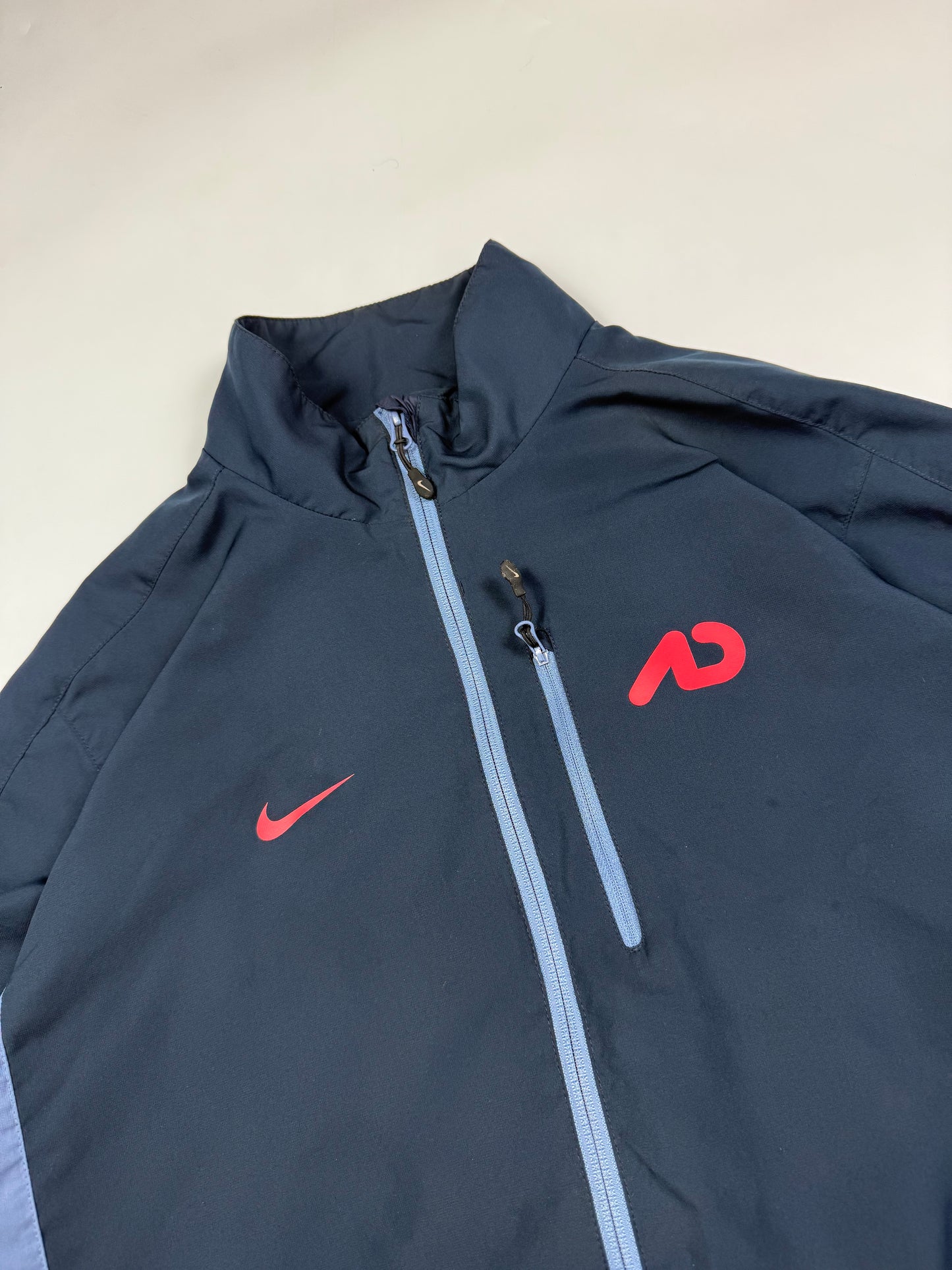 Nike athletic dept track jacket (L)
