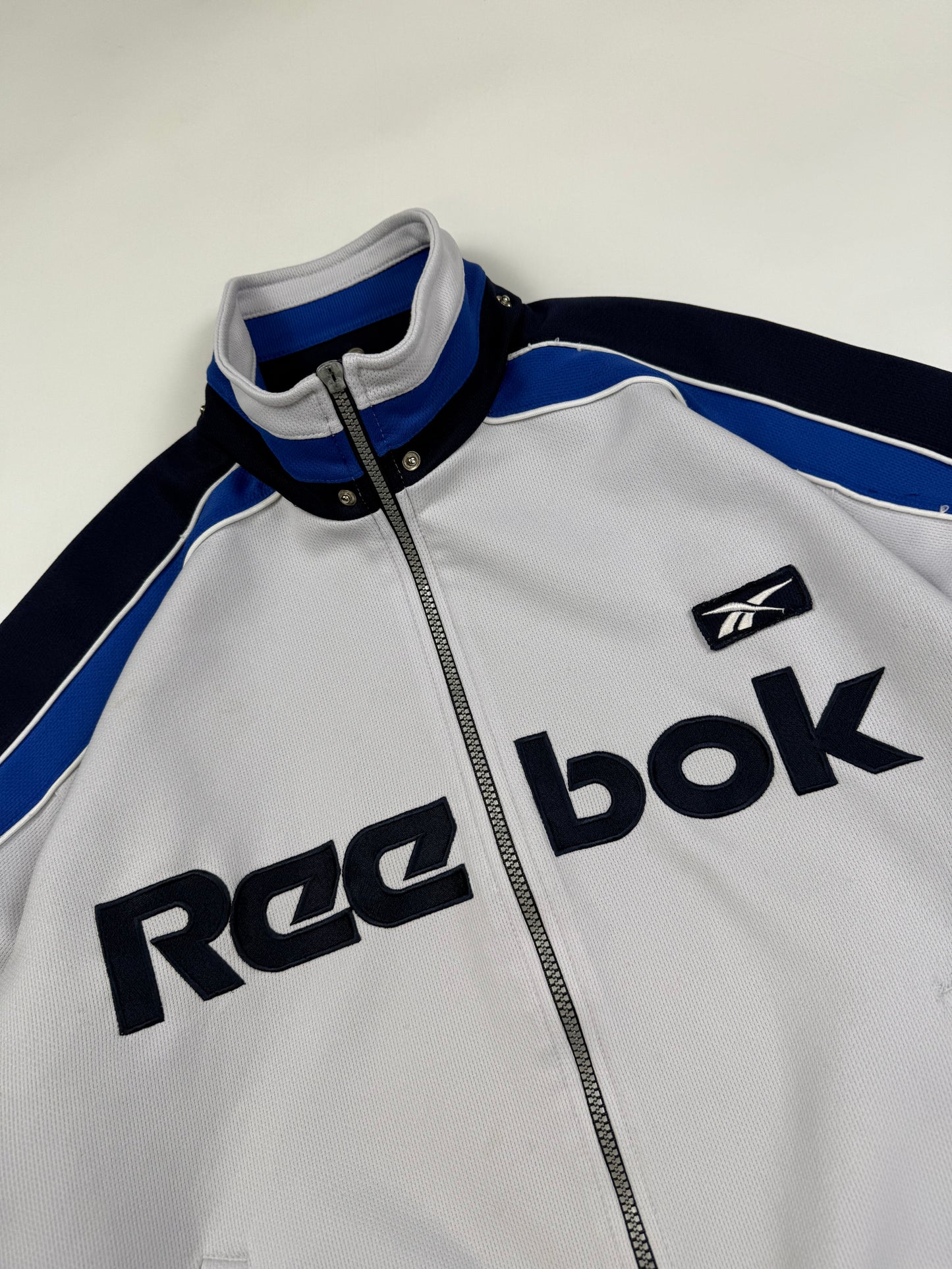 Vintage Reebok spell out track top (M)