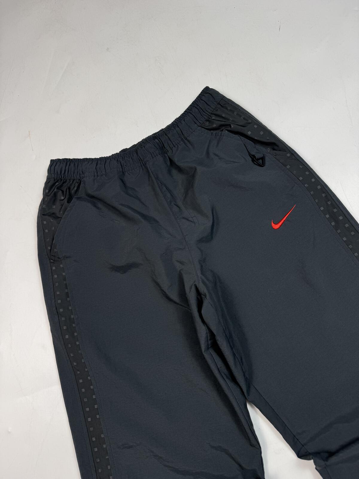 Vintage Y2K Nike baggy track pants (S)