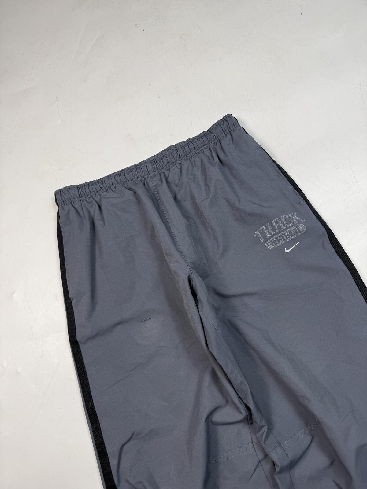 Vintage Nike side stripe baggy track pants (M)