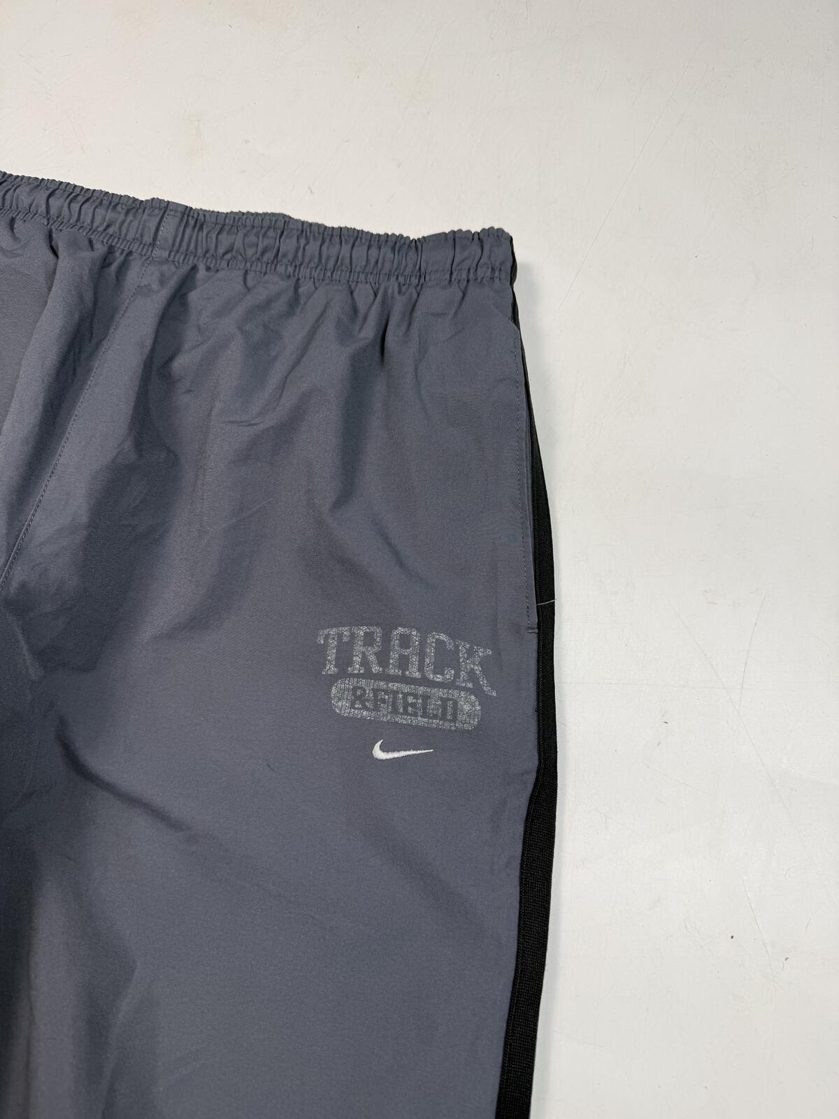 Vintage Nike side stripe baggy track pants (M)