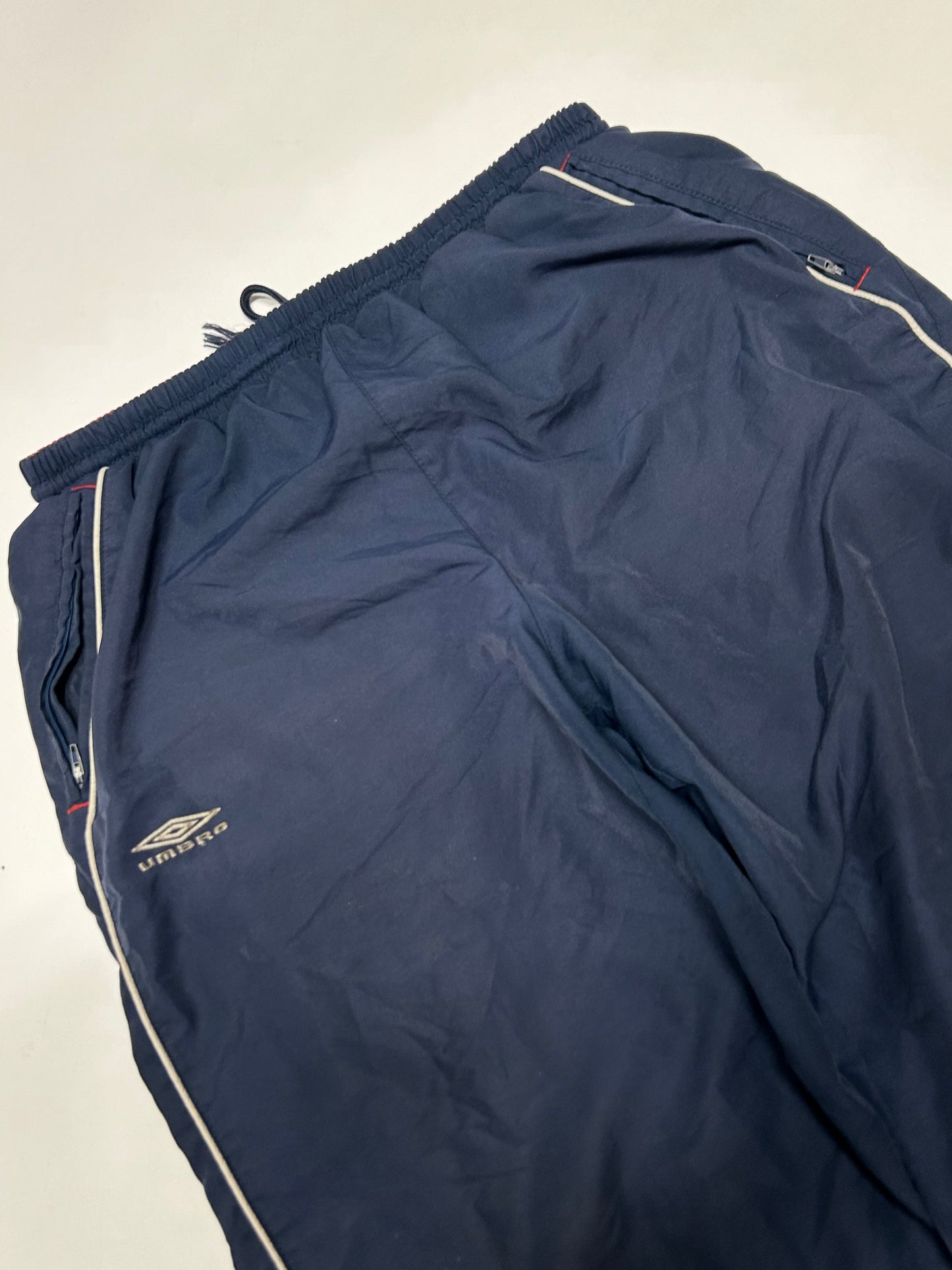 Vintage Umbro spell out track pants (L)