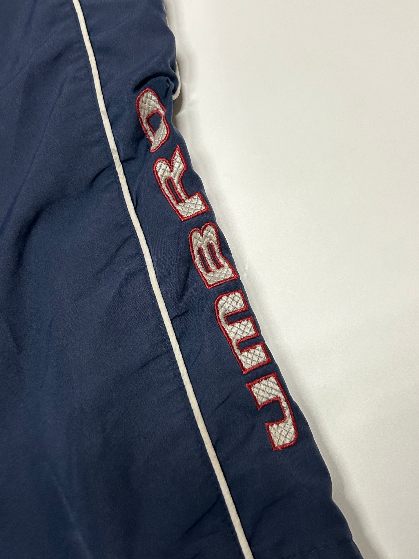 Vintage Umbro spell out track pants (L)