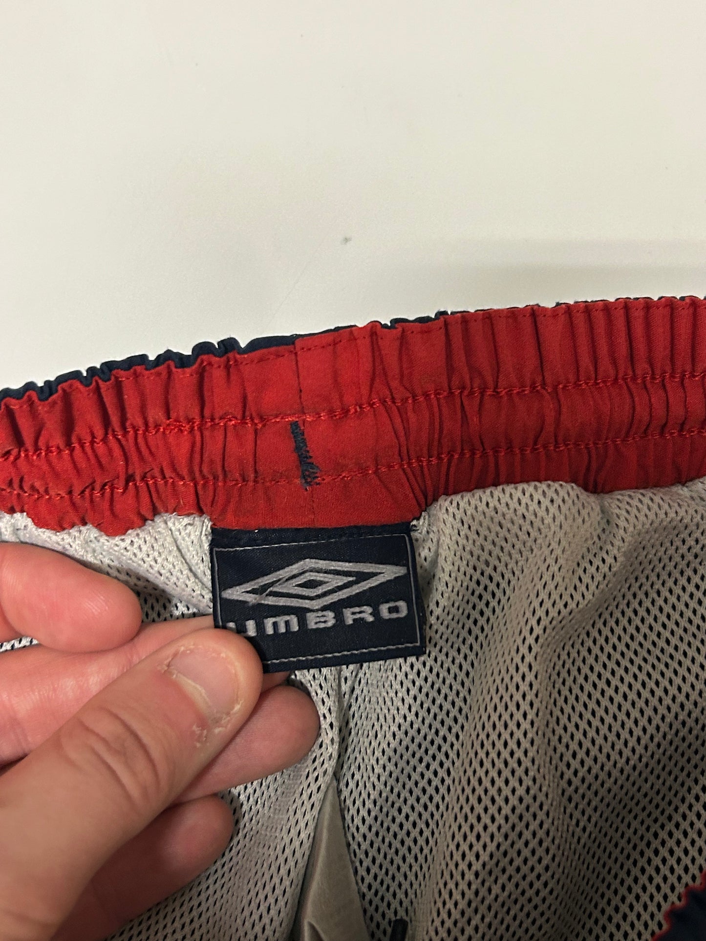 Vintage Umbro spell out track pants (L)