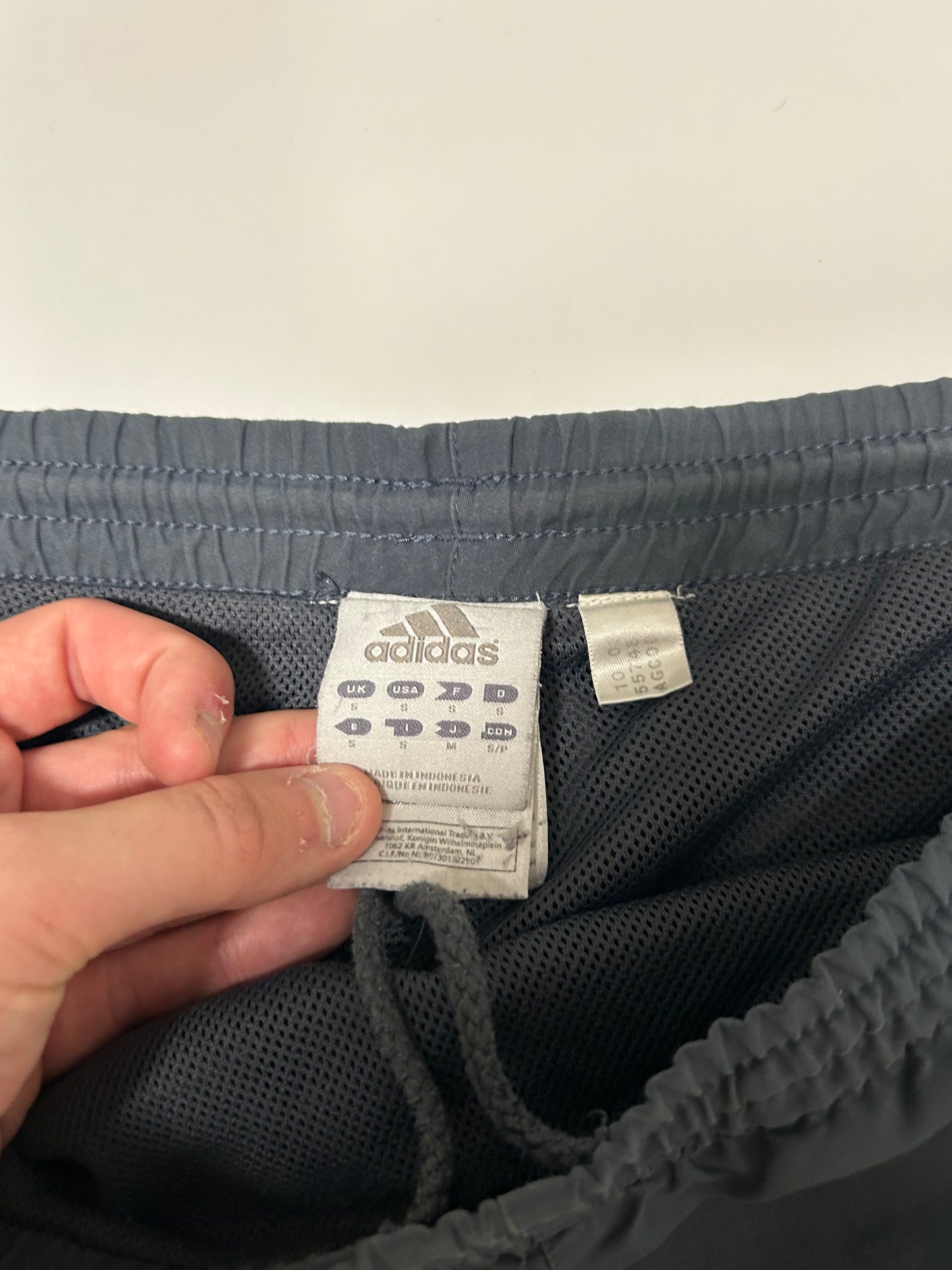 Vintage Adidas spell out track pants (M)