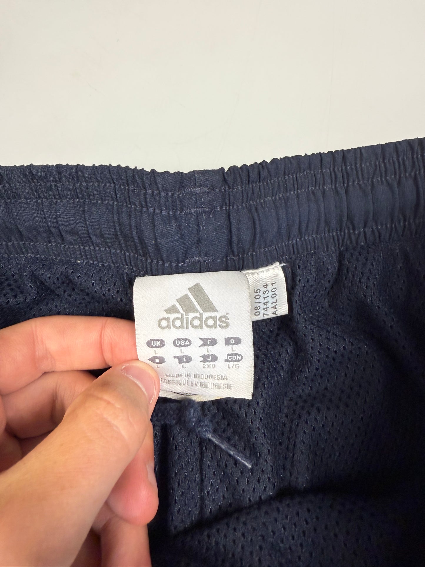 Vintage Adidas spell out baggy track pants (L)