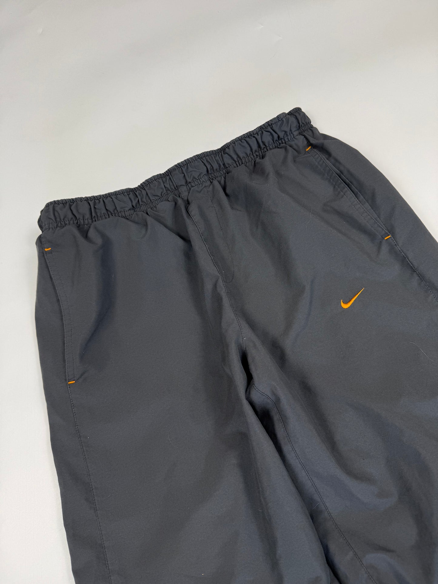 Vintage Nike spell out track pants (M)