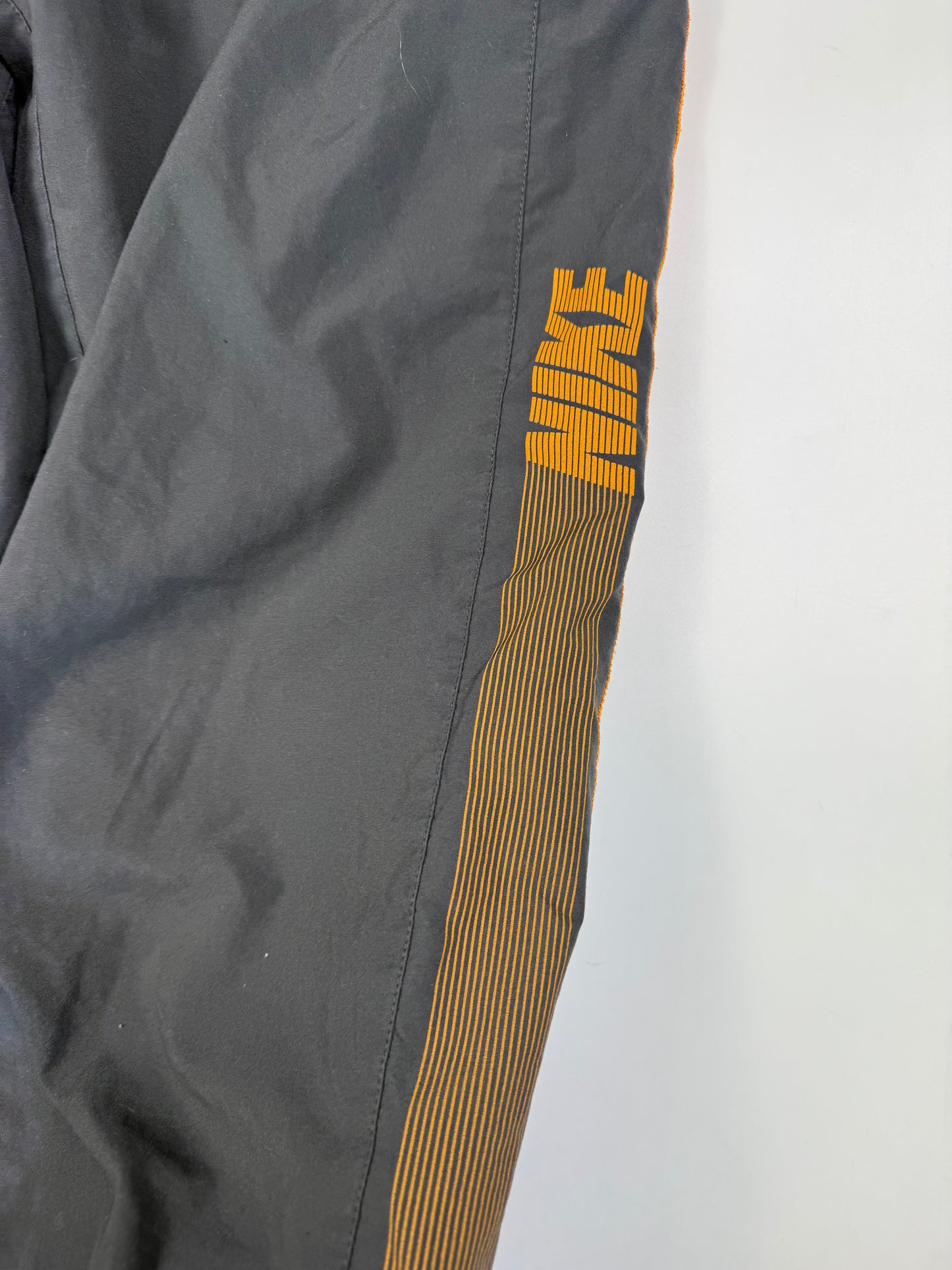Vintage Nike spell out track pants (M)
