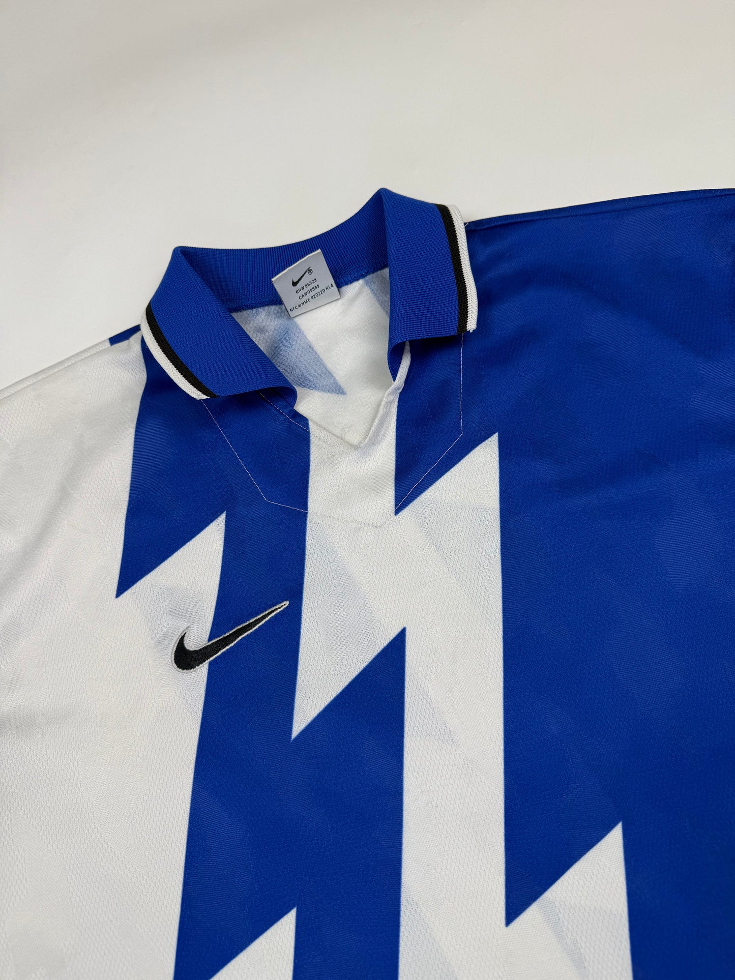 Vintage 90s Nike template thunder football shirt (M)