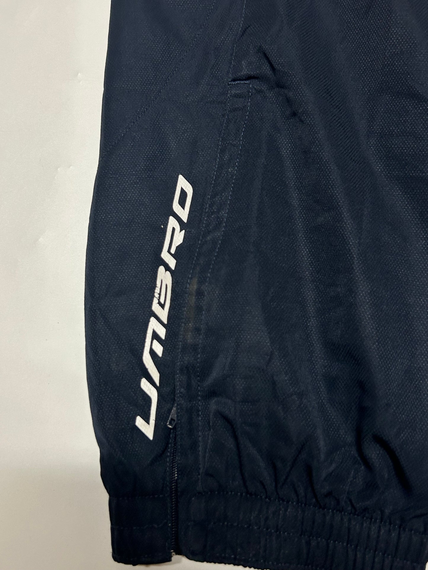Vintage Umbro spell out track pants (M)