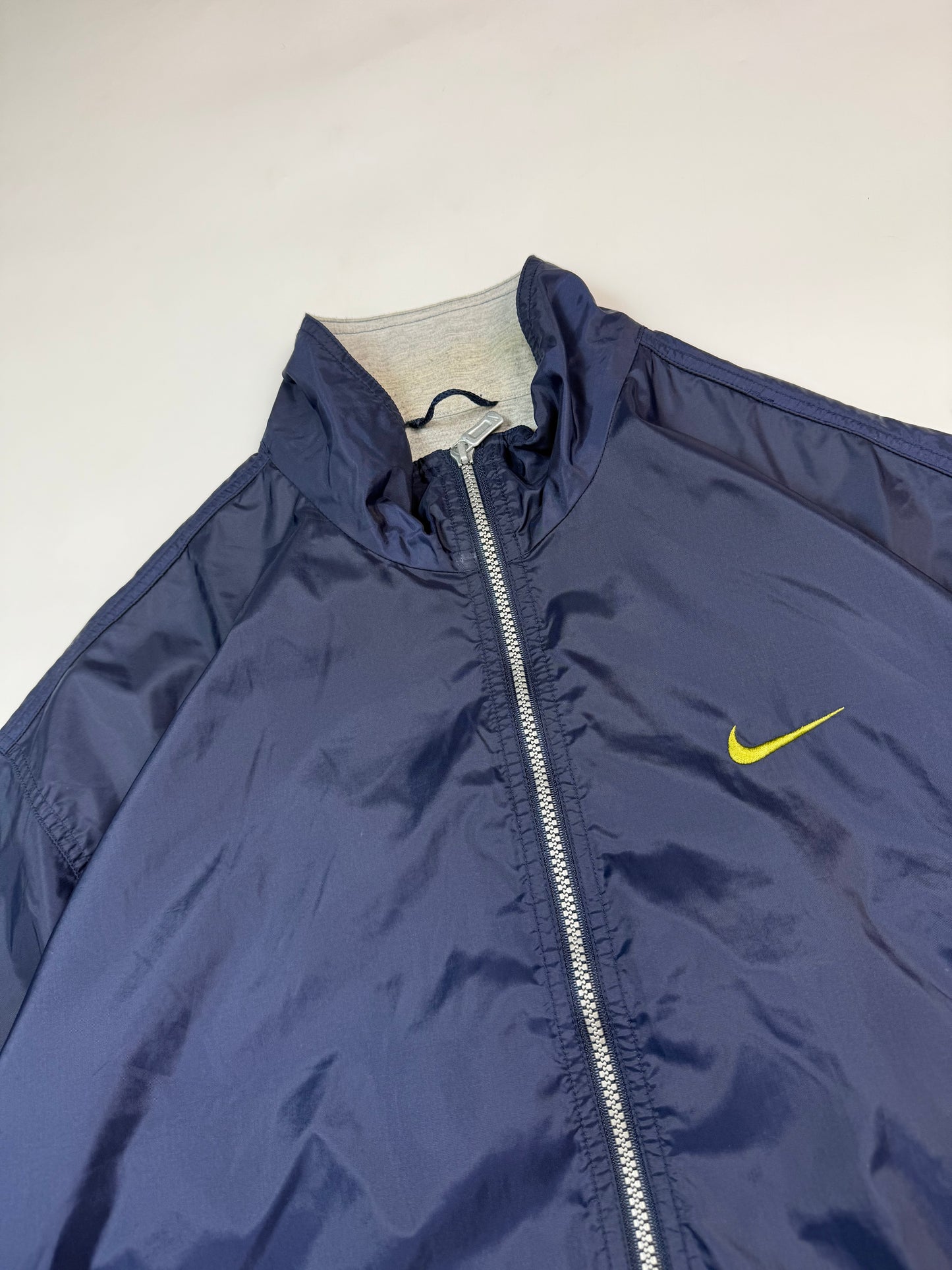 Vintage 90s Nike mini swoosh windbreaker track jacket (L)