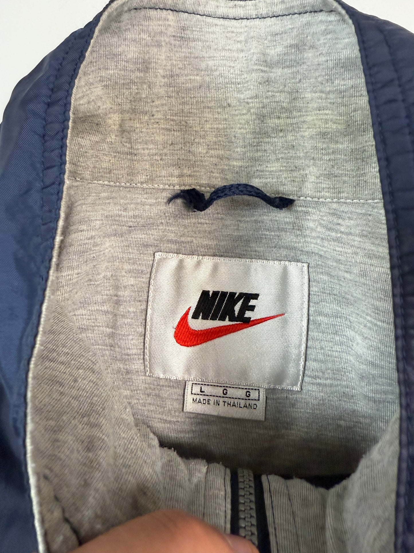 Vintage 90s Nike mini swoosh windbreaker track jacket (L)