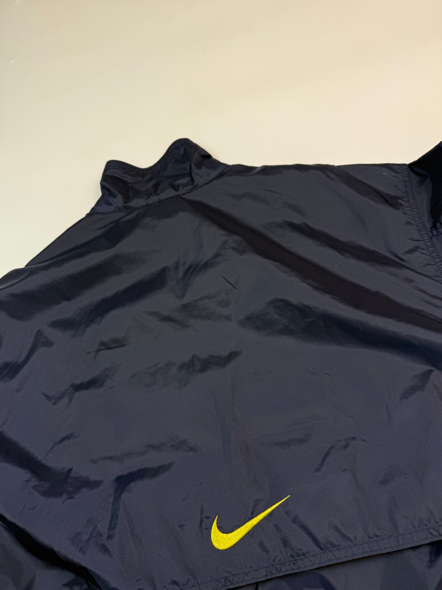 Vintage 90s Nike mini swoosh windbreaker track jacket (L)