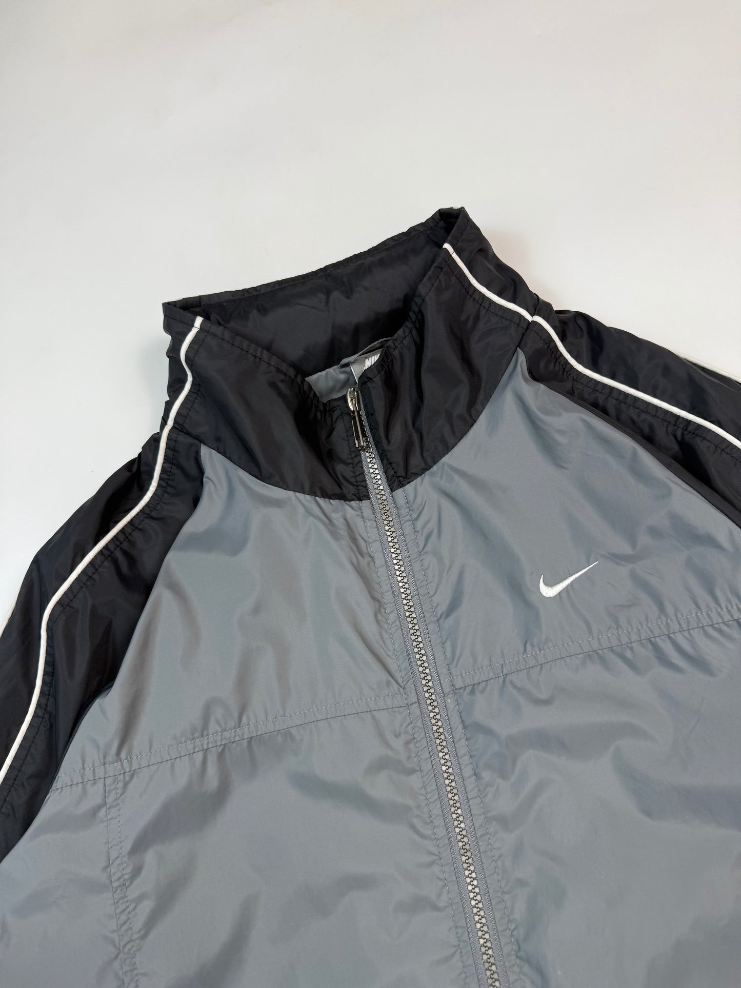 Vintage Nike mini swoosh track jacket (S)
