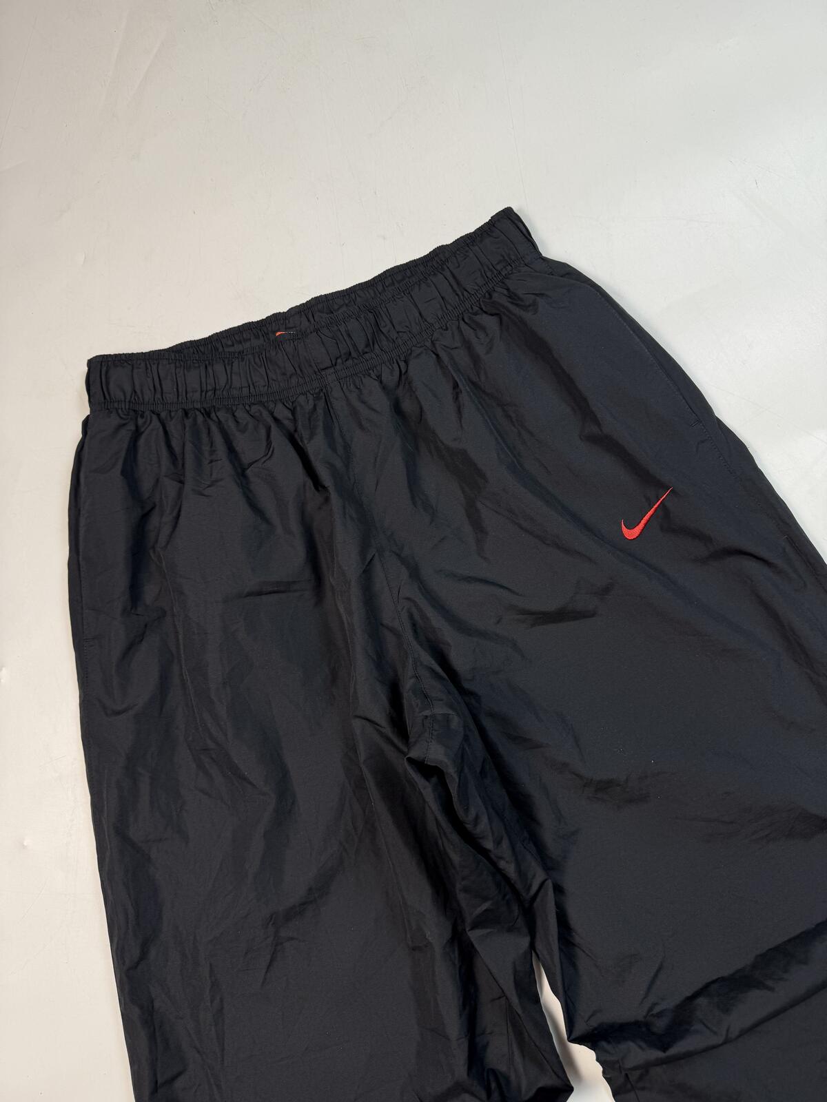 Vintage Nike mini swoosh baggy track pants (XL)