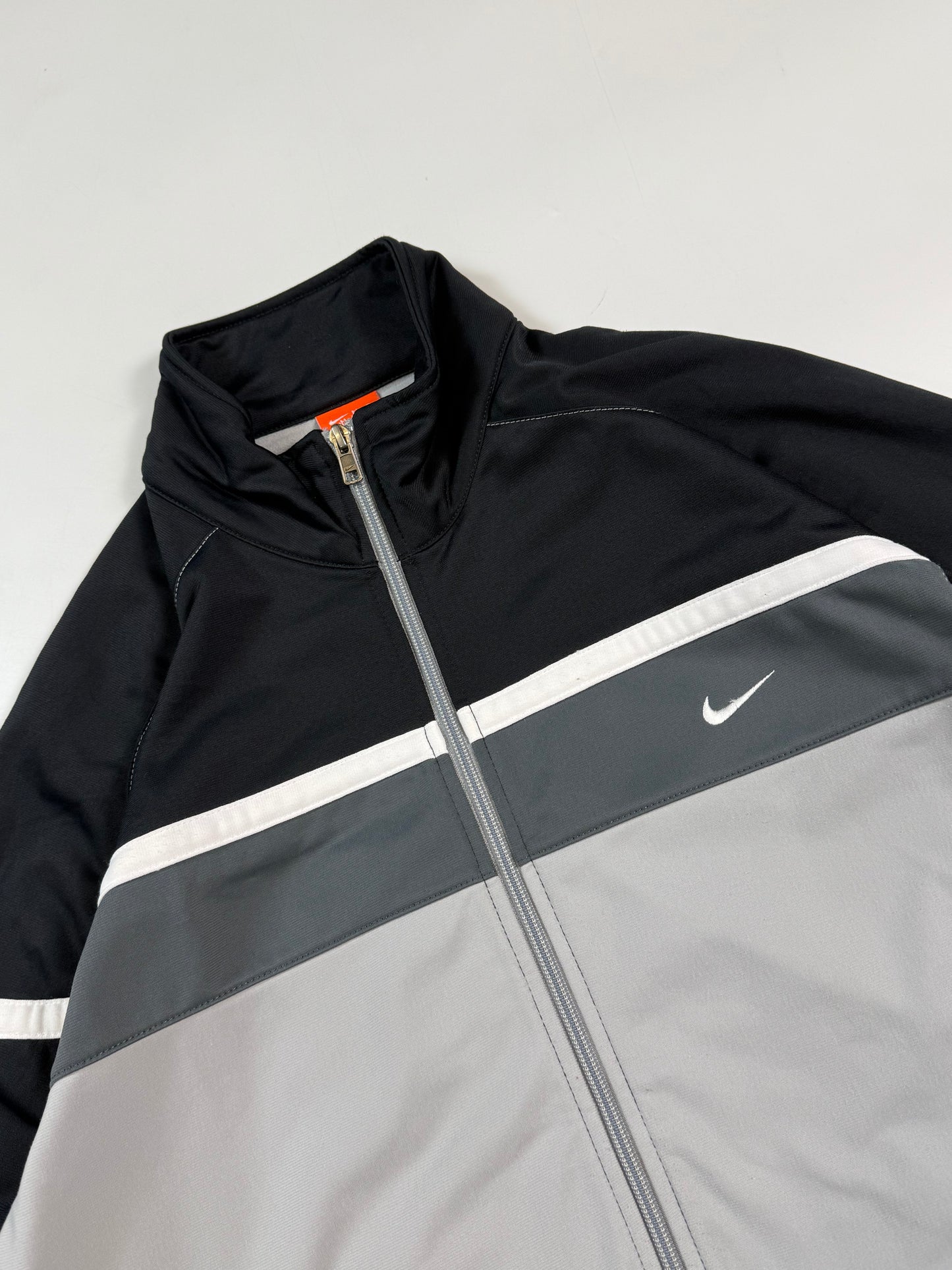 Vintage Nike mini swoosh track jacket (L)