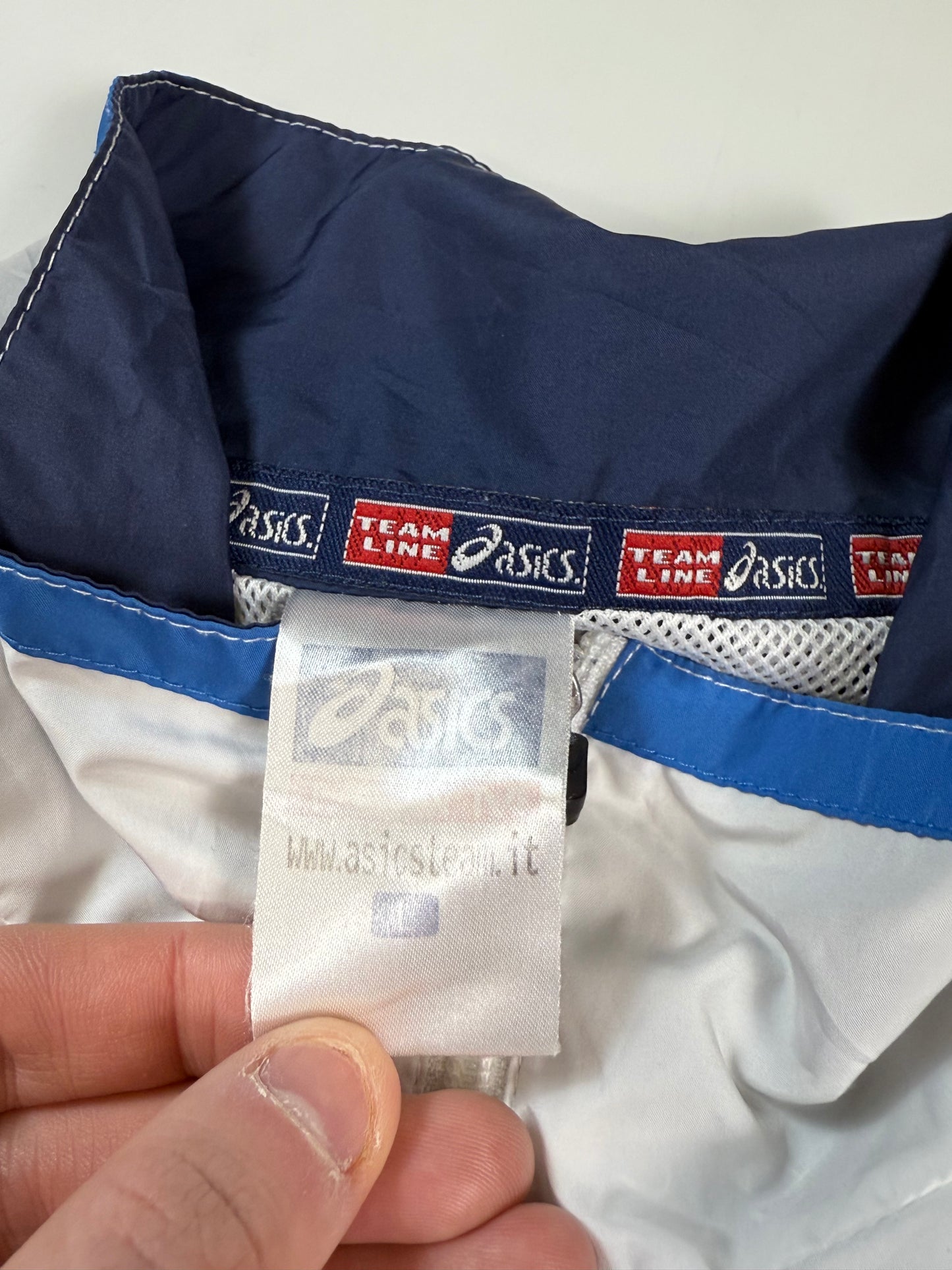 Vintage 90s Asics track jacket (L)