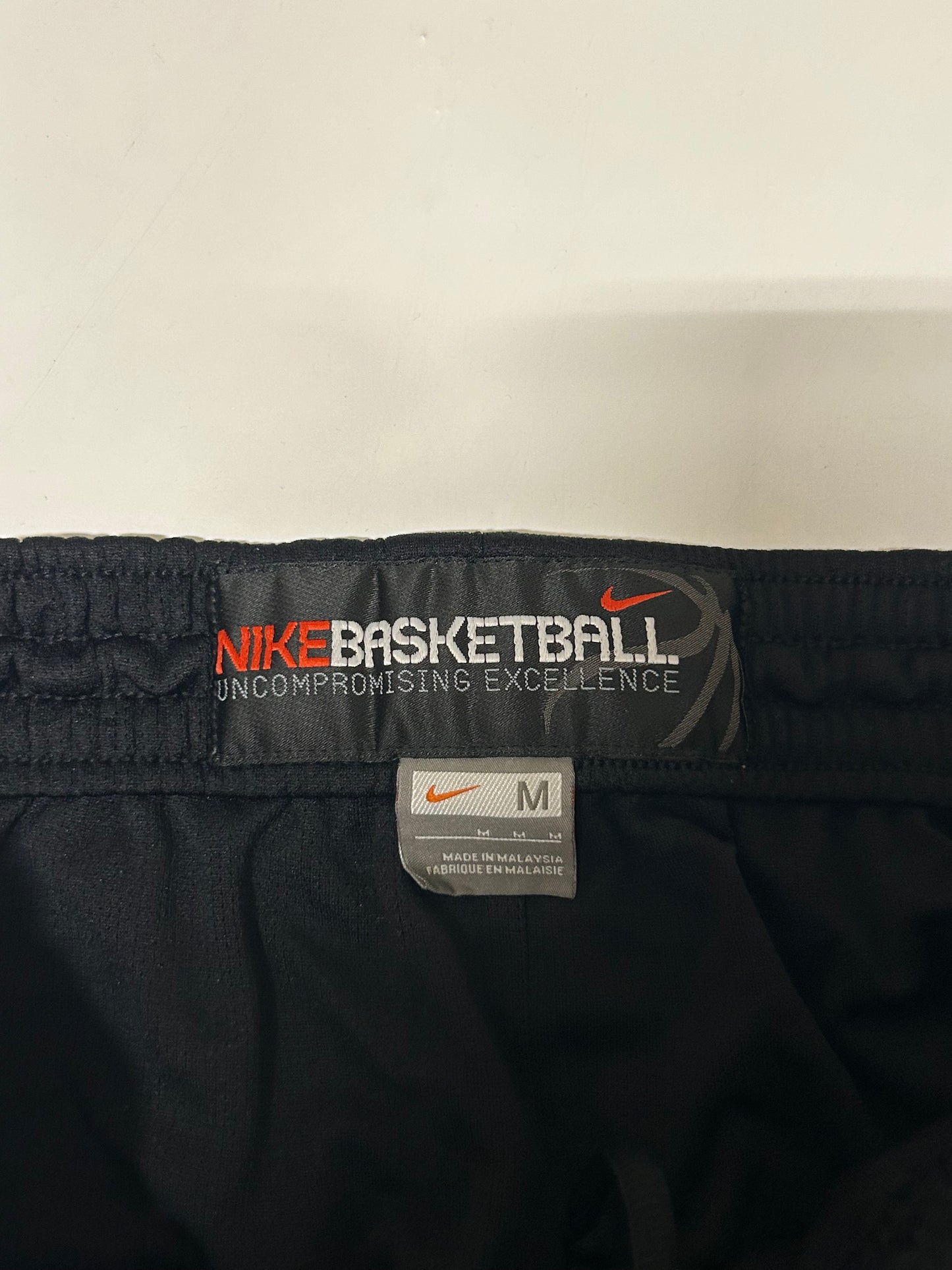 Vintage Nike basketball side stripe baggy track pants (M)