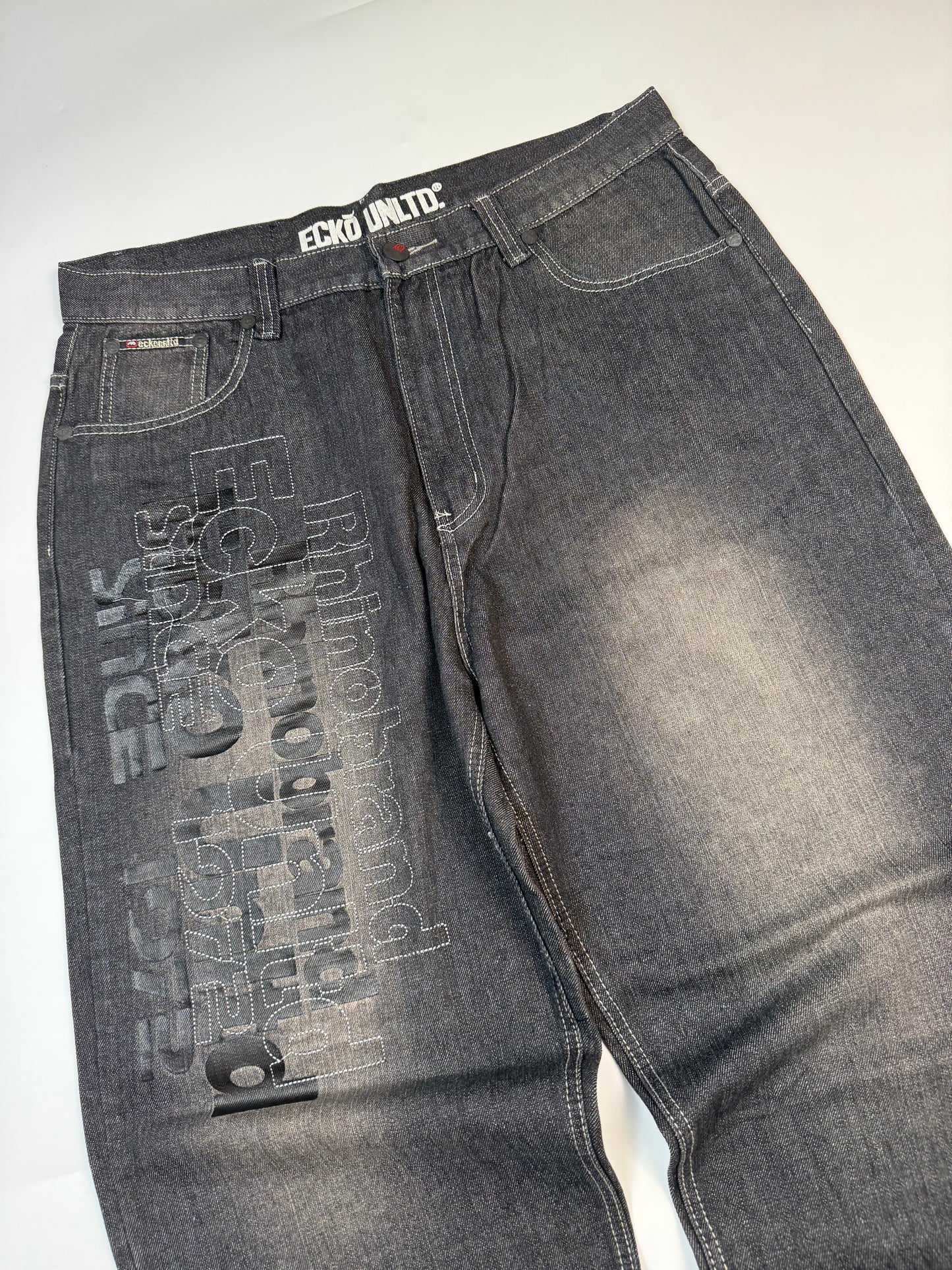 Vintage Ecko Unltd spell out baggy jeans (W38)