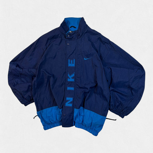 Vintage 90s Nike spell out windbreaker jacket (XL)
