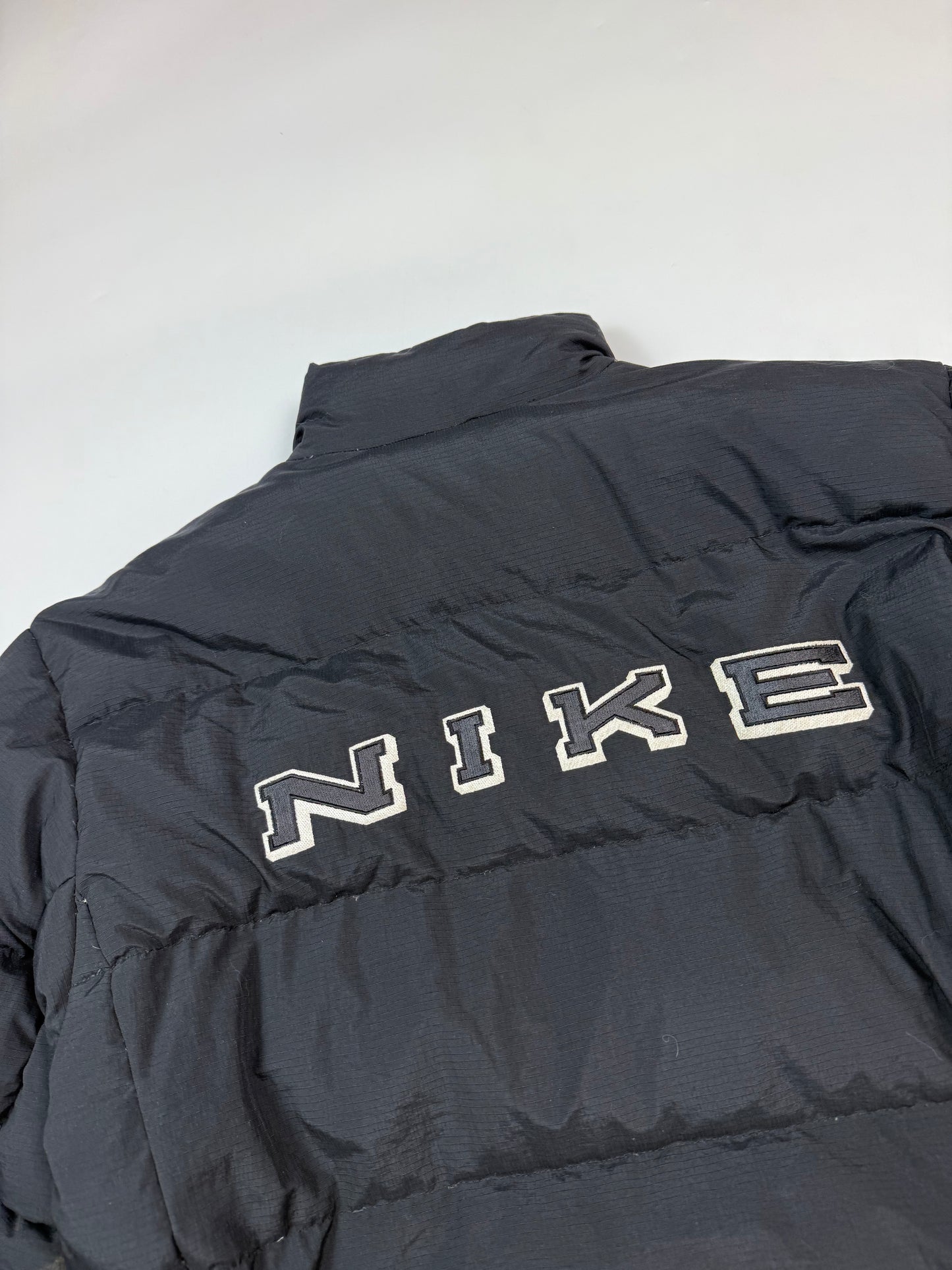 Vintage 90s Nike spell out reversible puffer jacket (S)